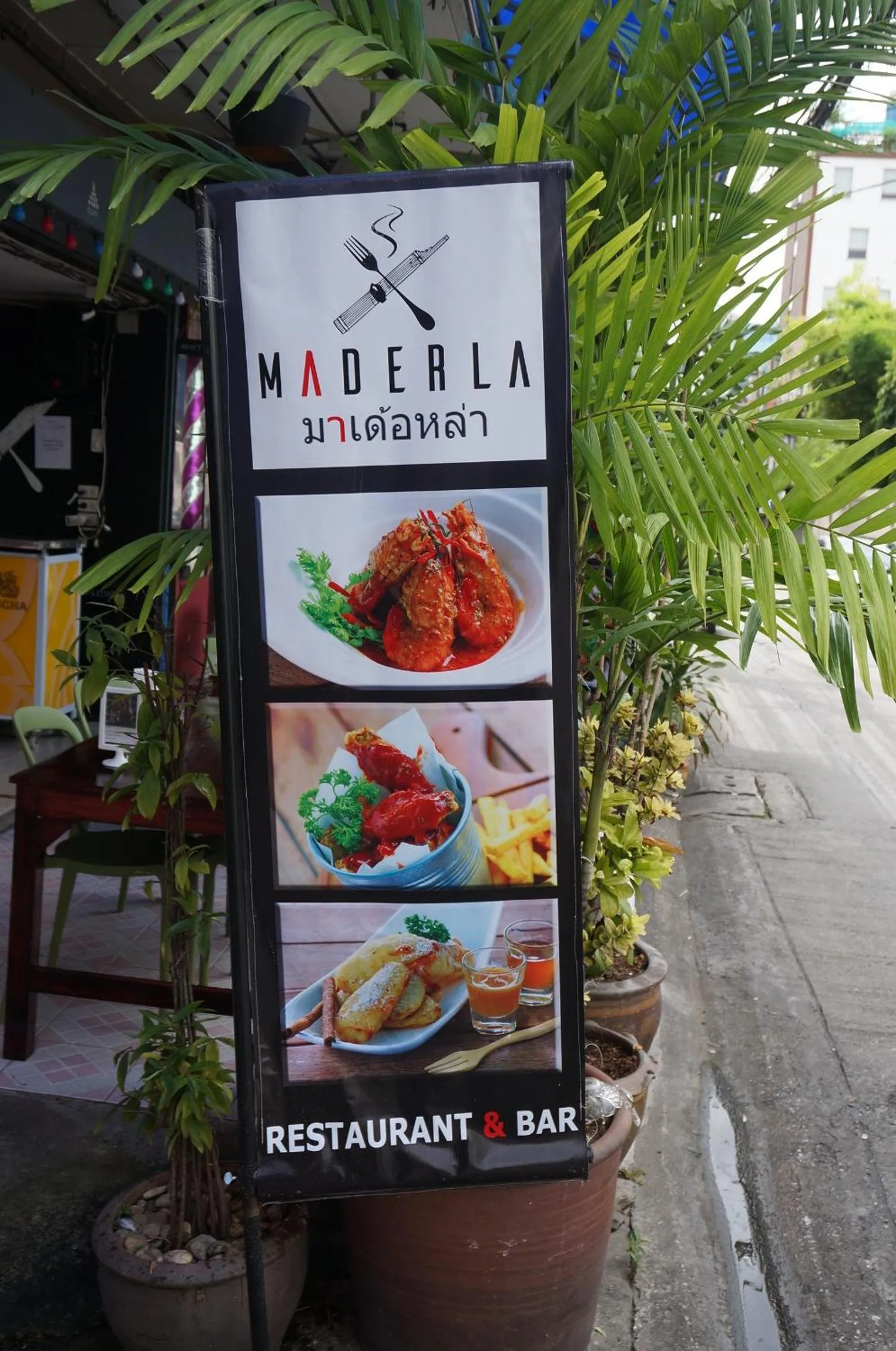 Property logo or sign in Maderla