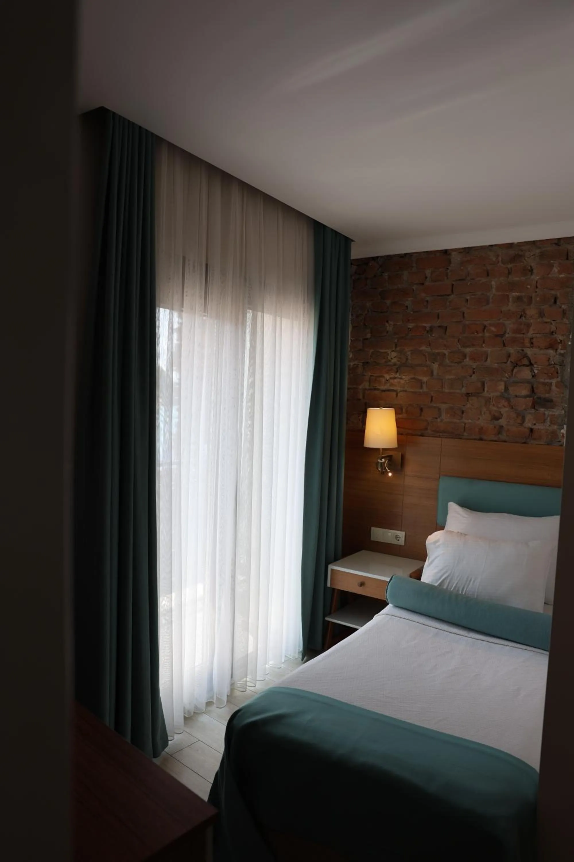 Photo of the whole room, Bed in Sardinia Otel