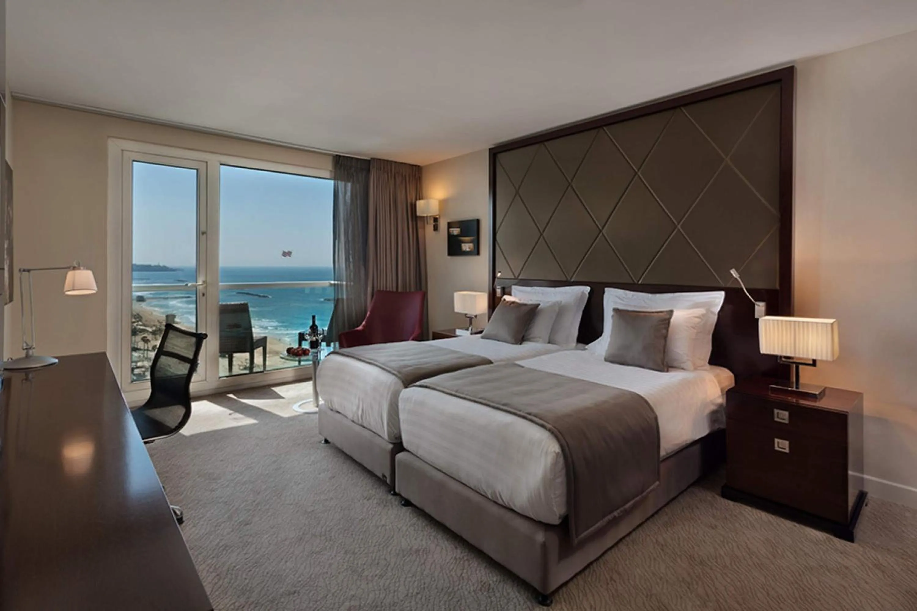 Photo of the whole room, Bed in Crowne Plaza Tel Aviv Beach by IHG