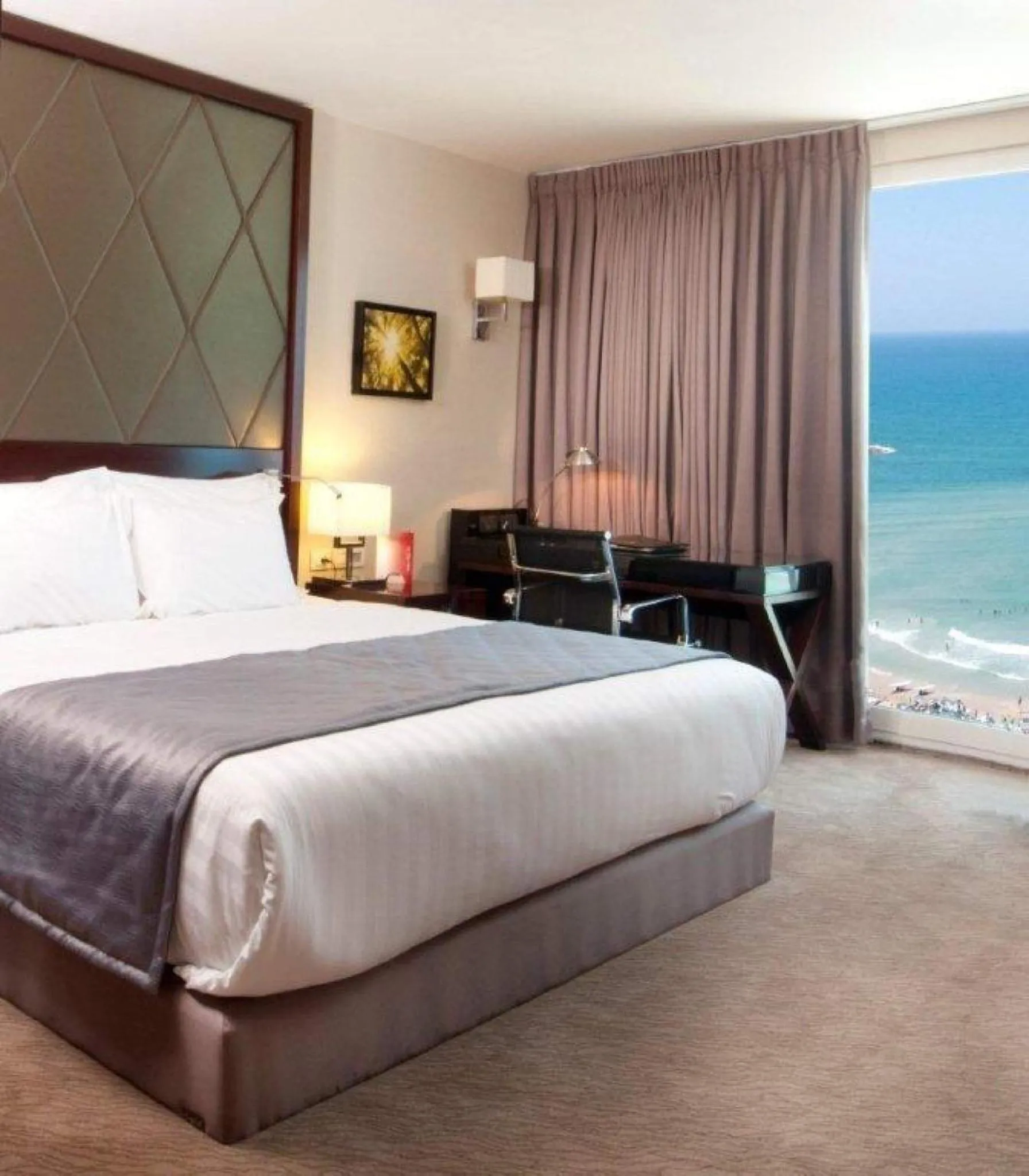 Photo of the whole room, Bed in Crowne Plaza Tel Aviv Beach by IHG
