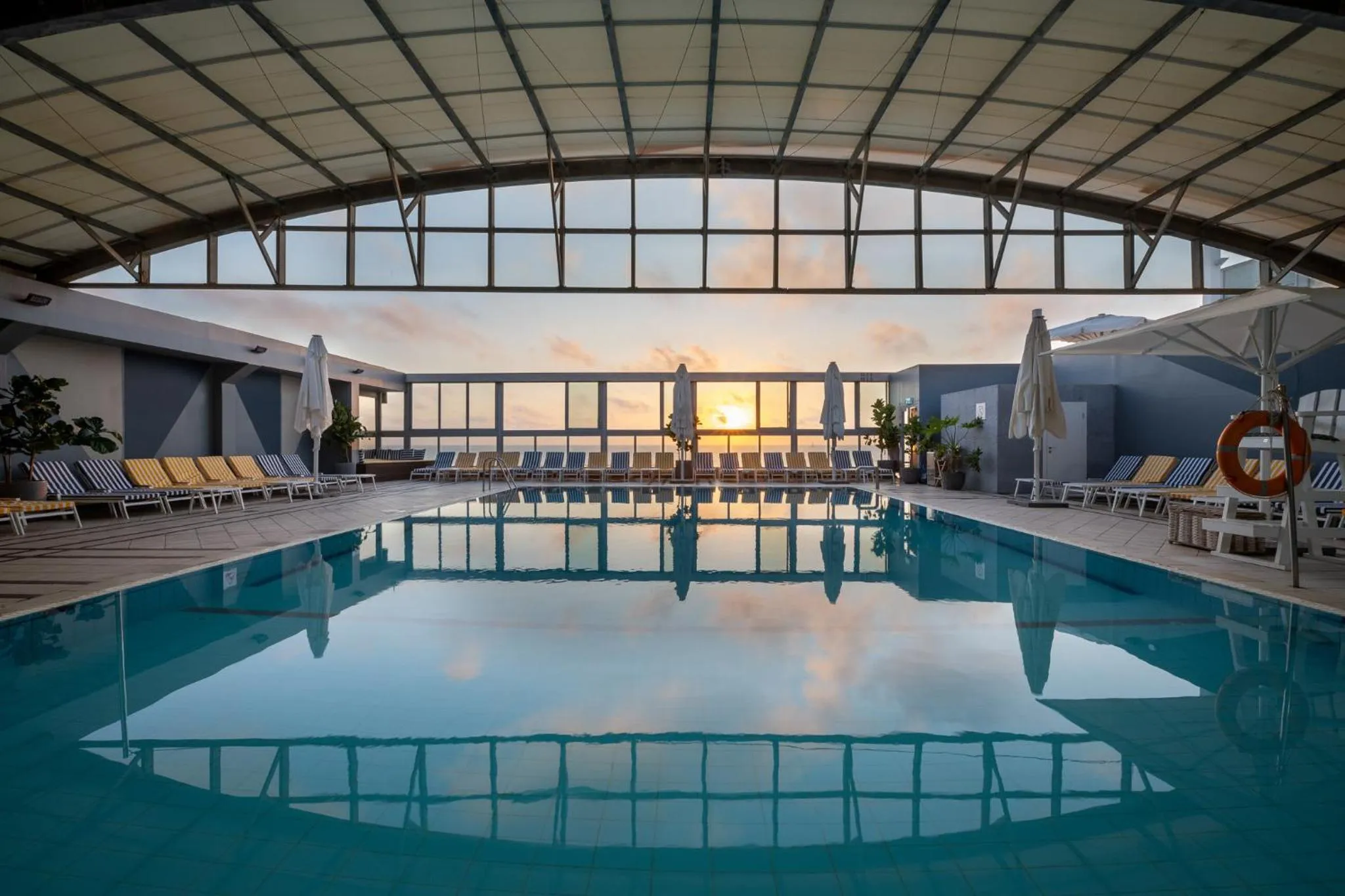 Swimming pool in Crowne Plaza Tel Aviv Beach by IHG