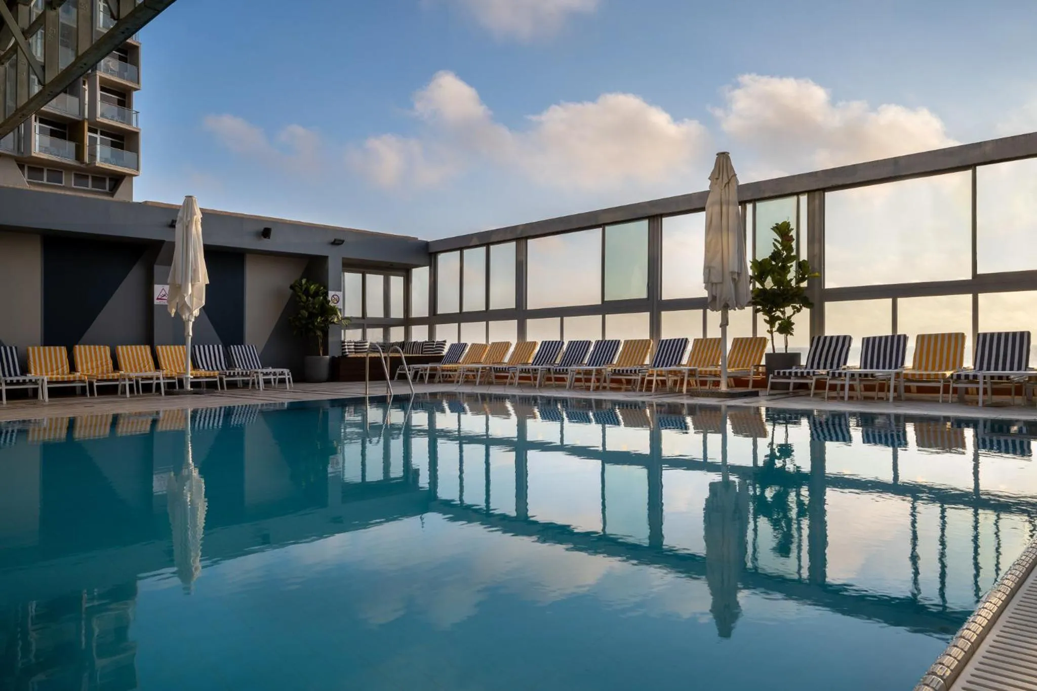 Swimming pool in Crowne Plaza Tel Aviv Beach by IHG