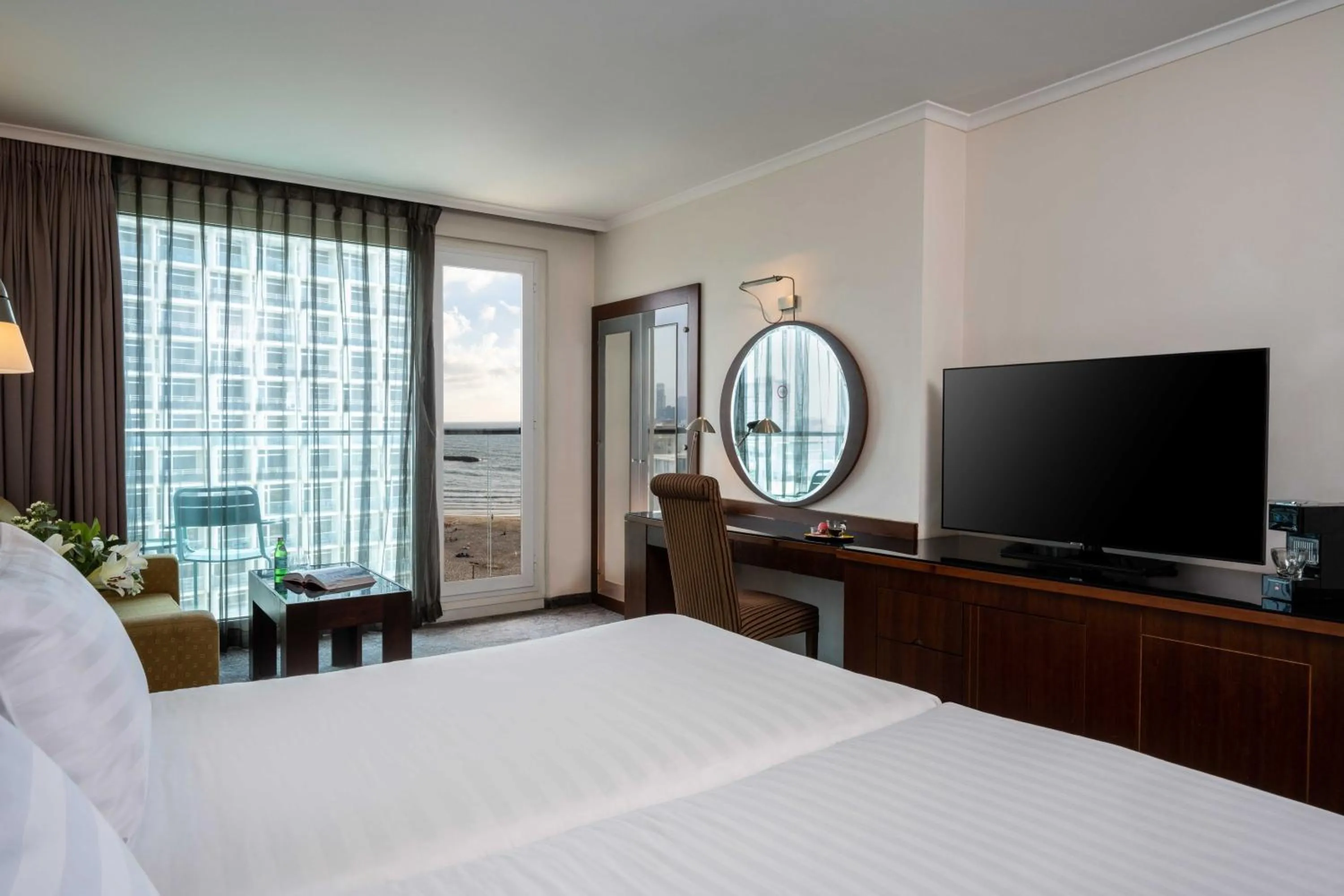 Photo of the whole room, Bed in Crowne Plaza Tel Aviv Beach by IHG