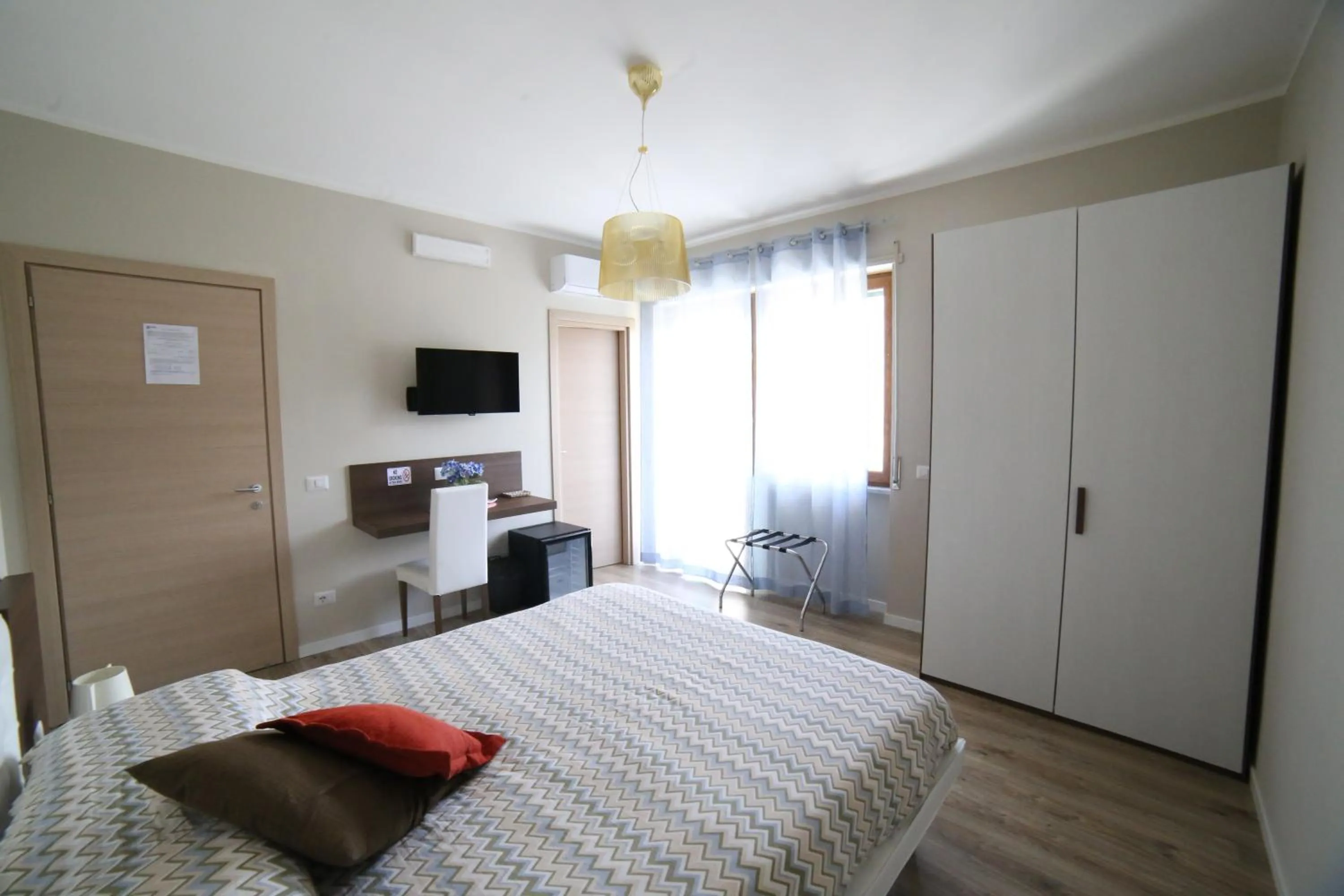 Bed in Sorrento Coast Suites B&B