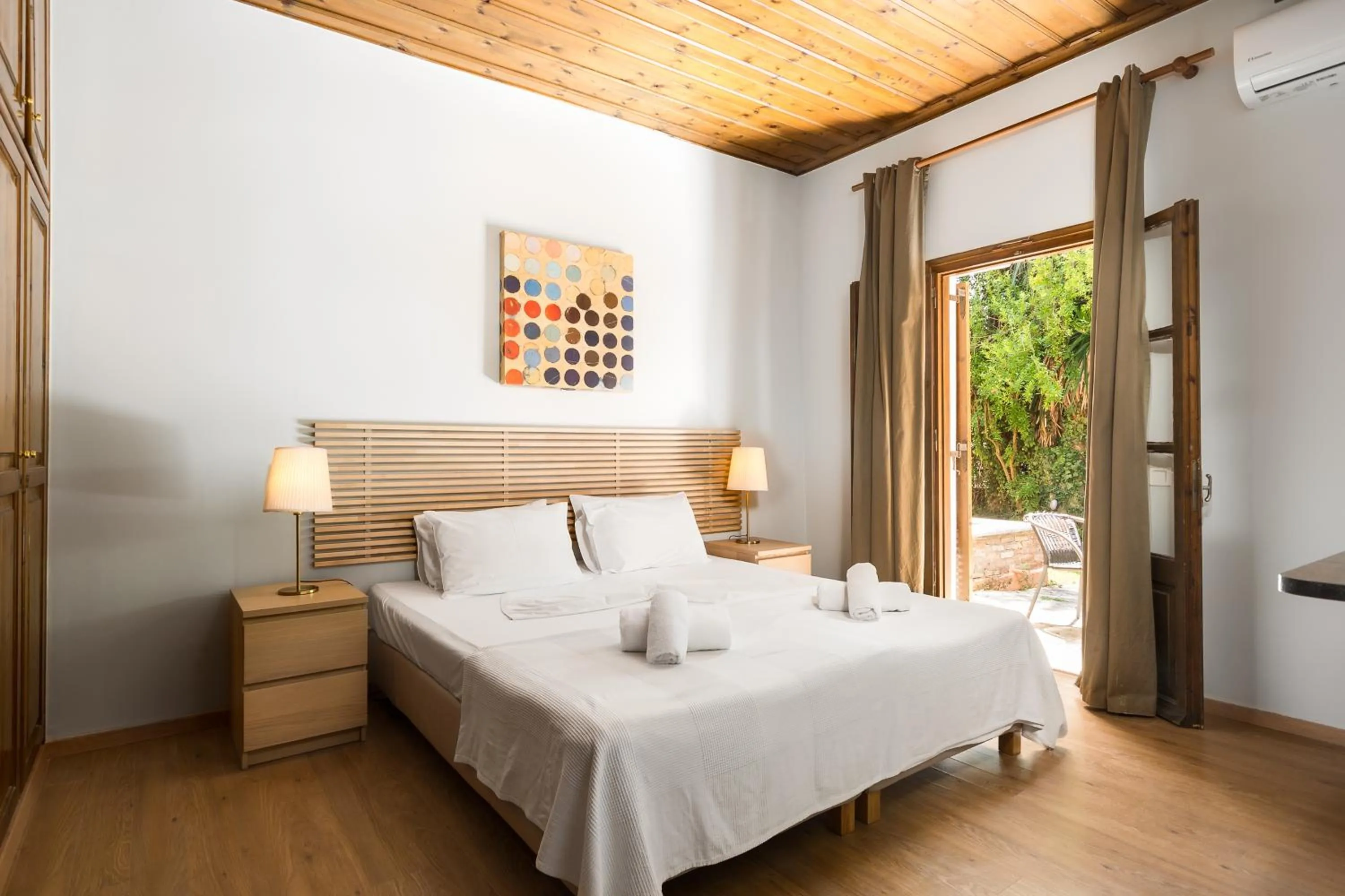 Bed in Folies Corfu Town Hotel Apartments