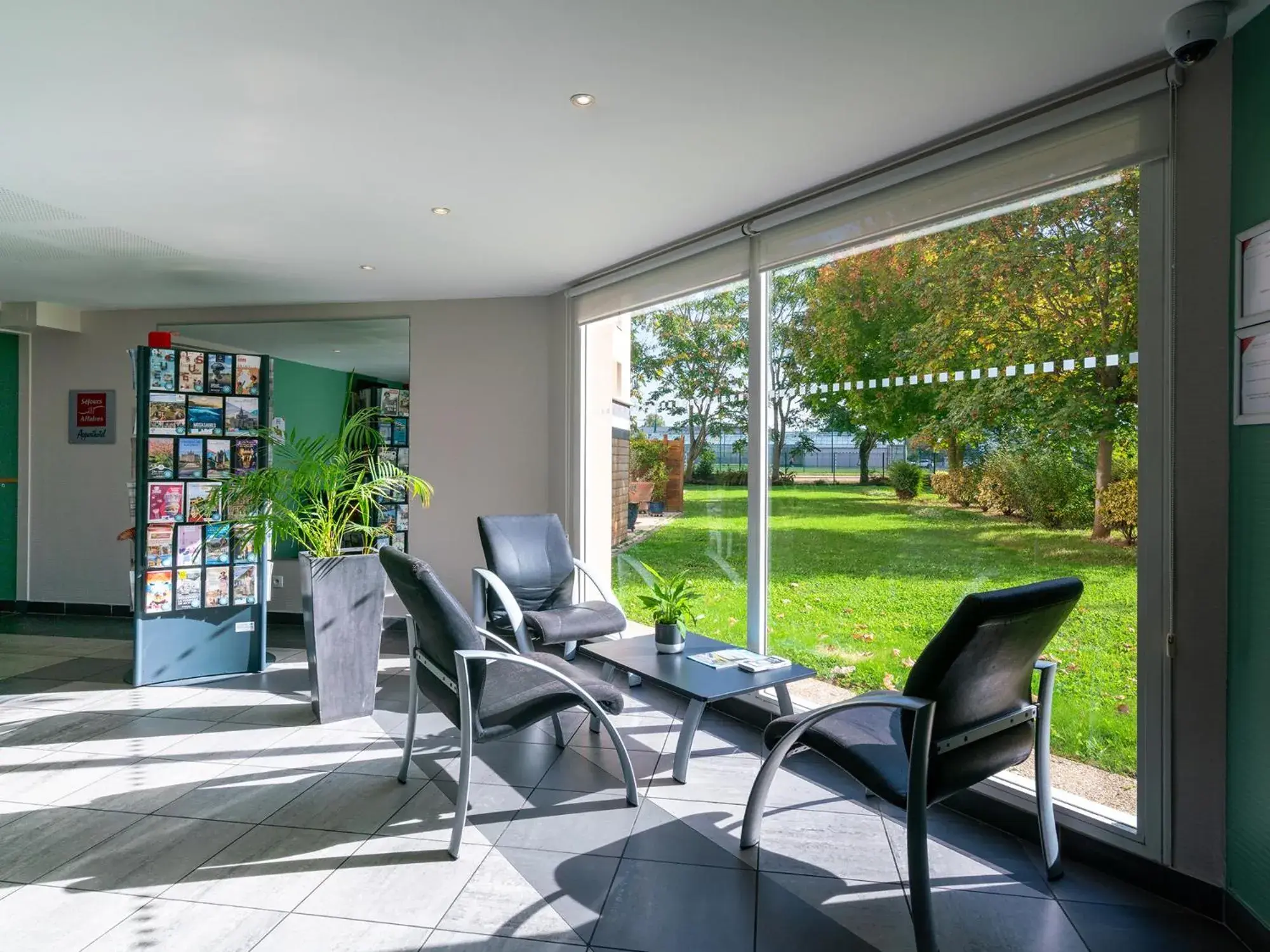 Lobby or reception in Séjours & Affaires Caen Le Clos Beaumois Lobby or reception in Séjours & Affaires Caen Le Clos Beaumois