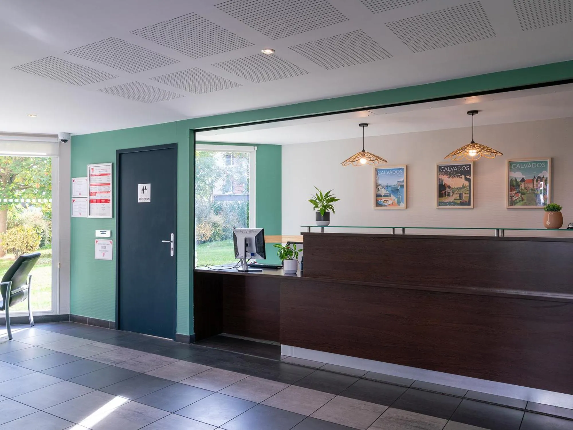 Lobby or reception in Séjours & Affaires Caen Le Clos Beaumois