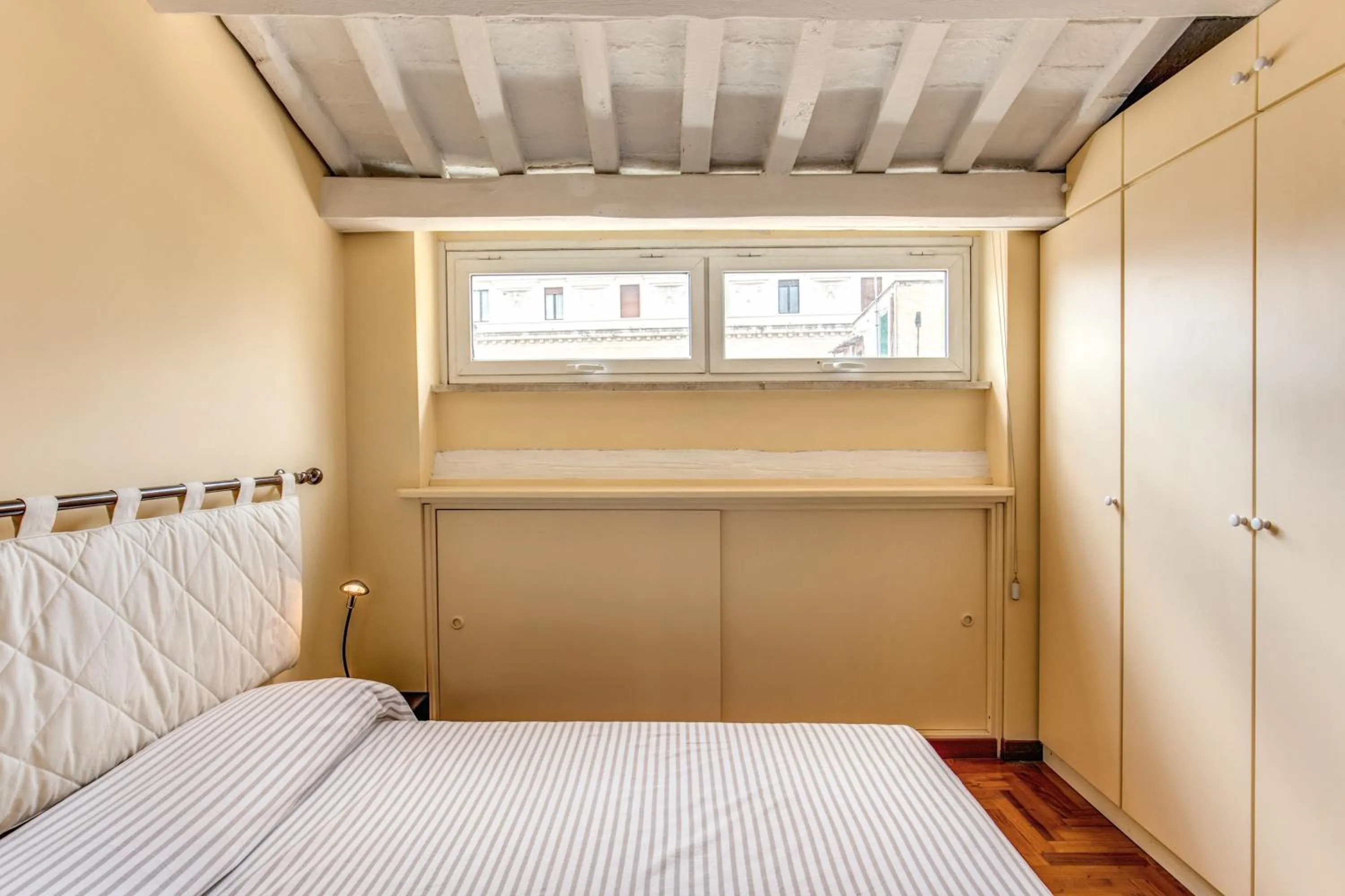 Bed in Trastevere Attic with Terrace