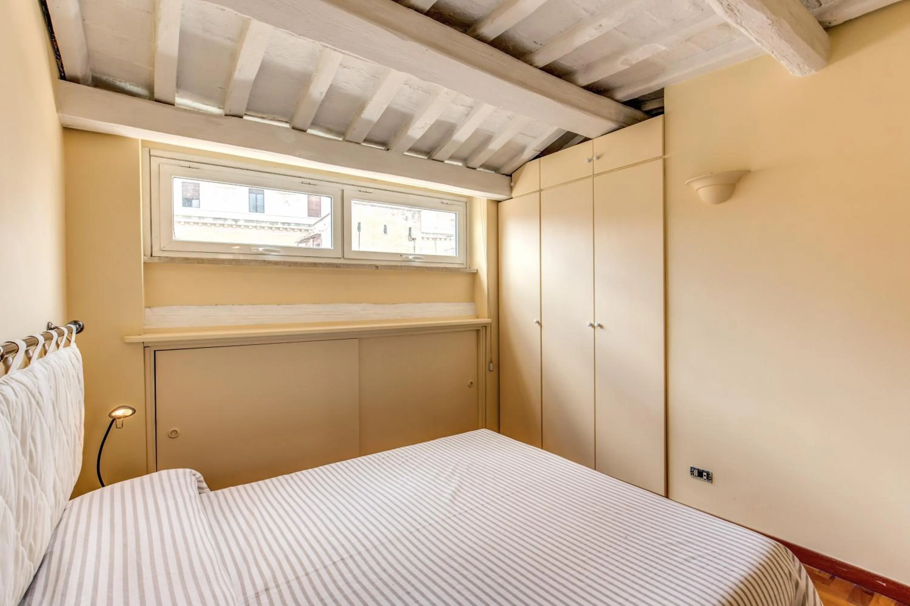 Bed in Trastevere Attic with Terrace