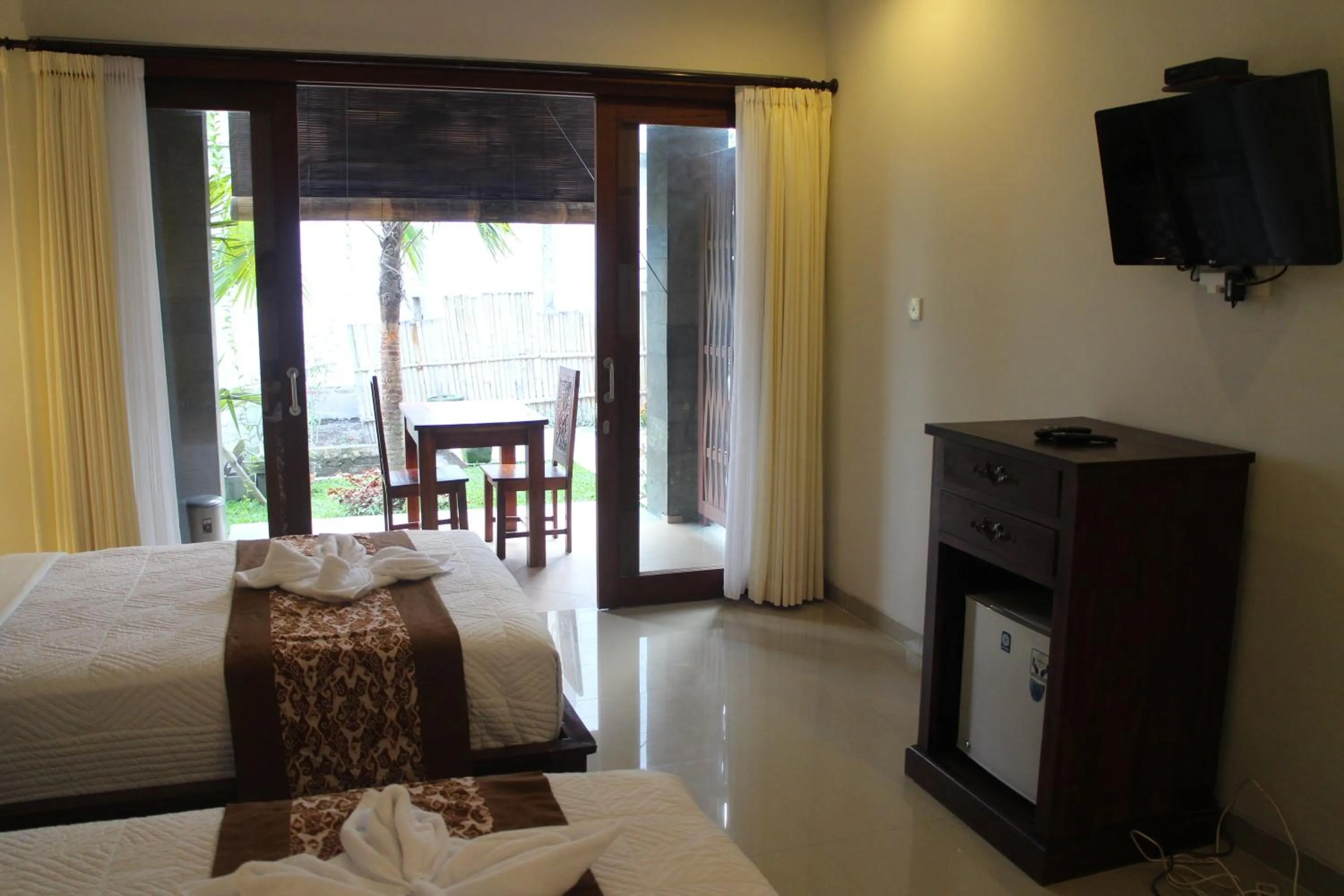 Bed in Betutu Bali Villas