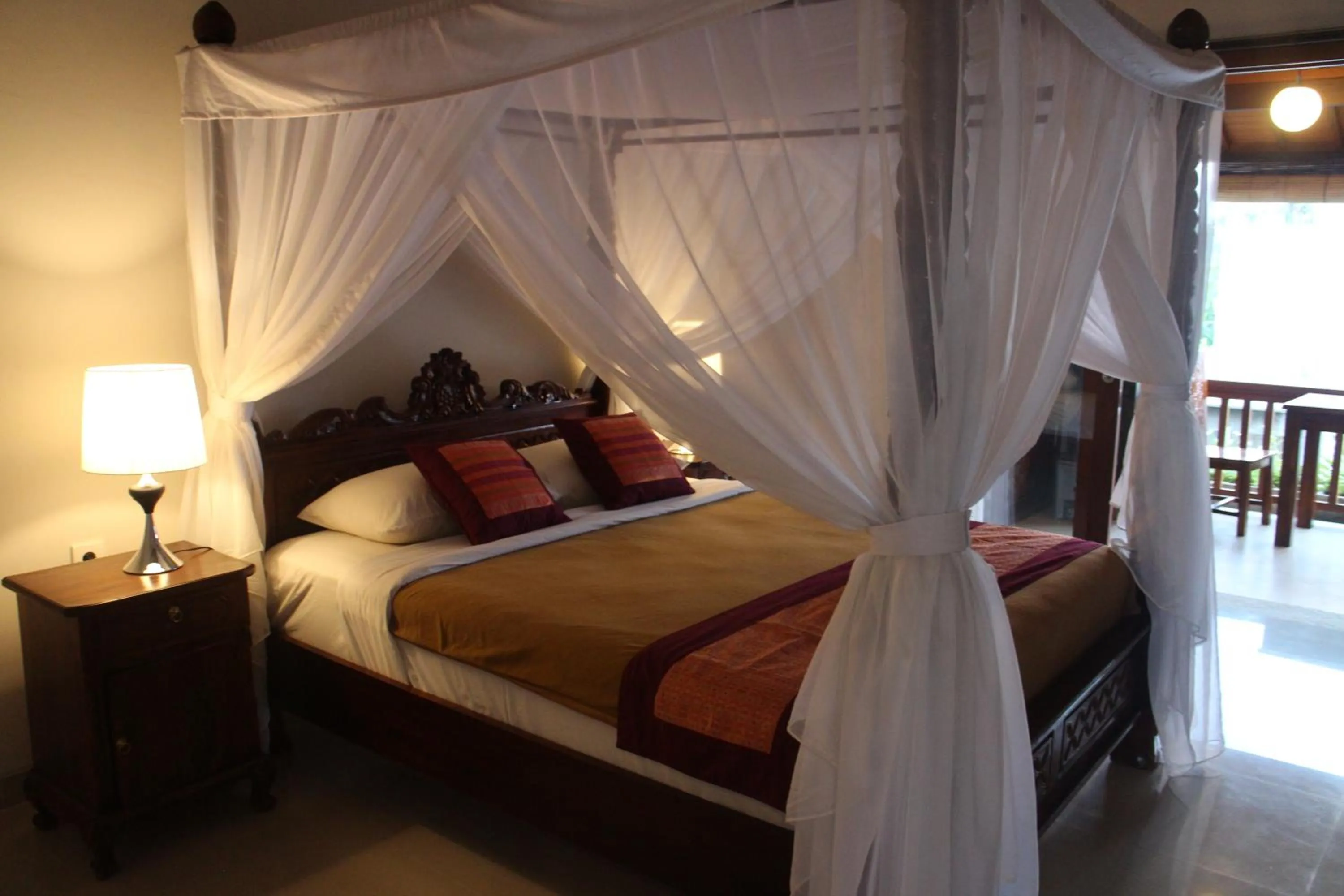 Bed in Betutu Bali Villas