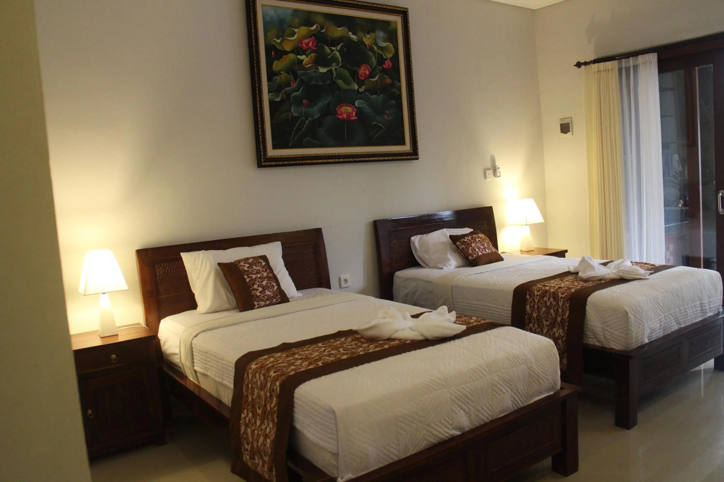 Bed in Betutu Bali Villas