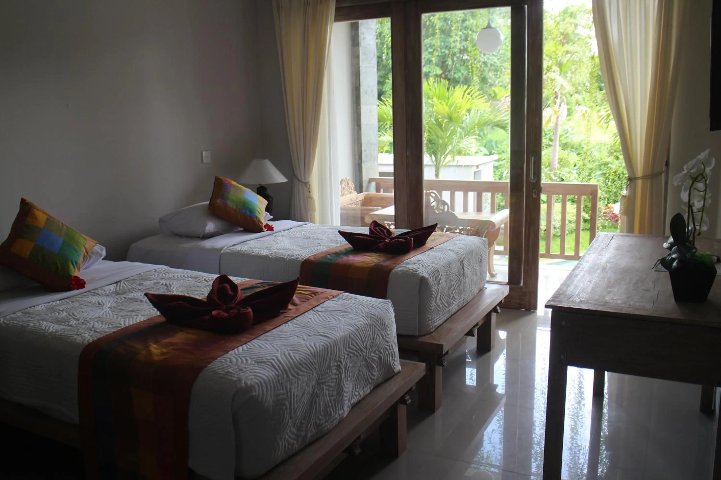 Bed in Betutu Bali Villas