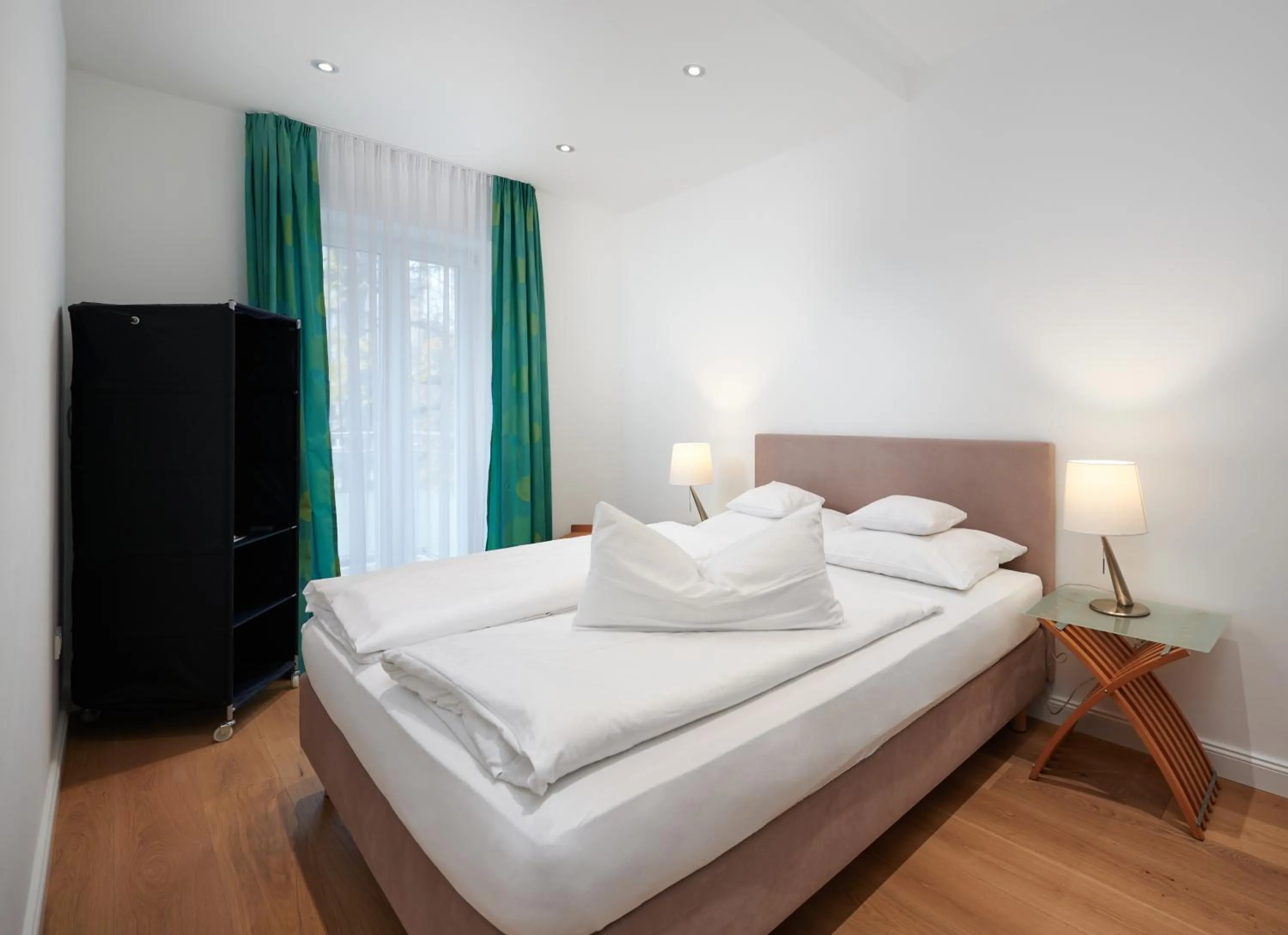 Bed in Deluxe Apartments Christina 120 m² im Design Hotel Vosteen