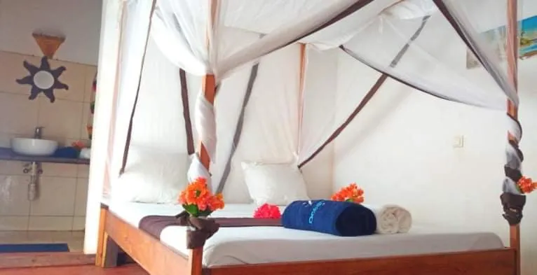 Photo of the whole room, Bed in Hotel Océan Beach Sakatia