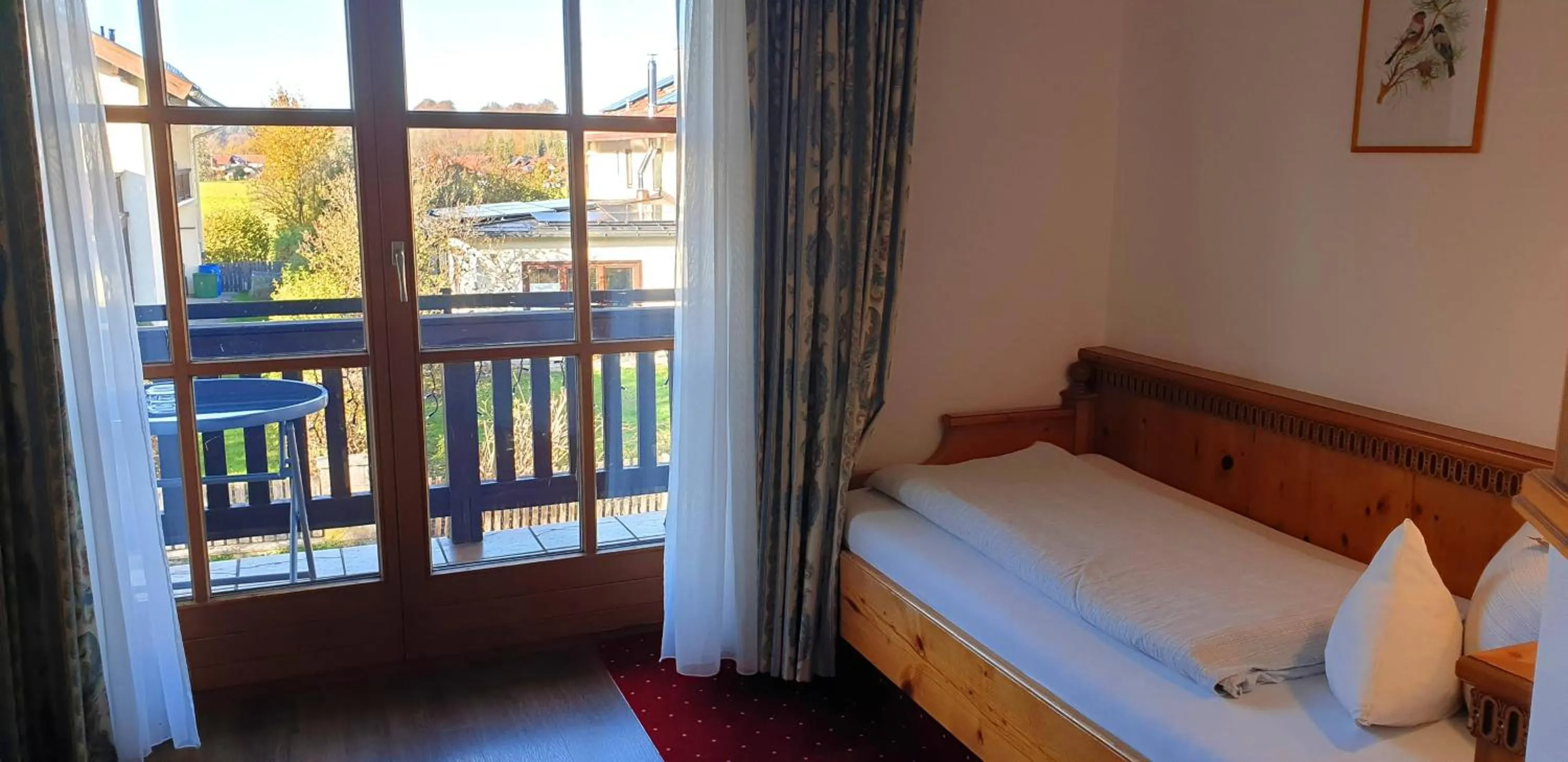 Bed in Alpenotel Rosenhof Ruhpolding, Wellness, Chiemgau Karte, Travelingo Bonus Programm