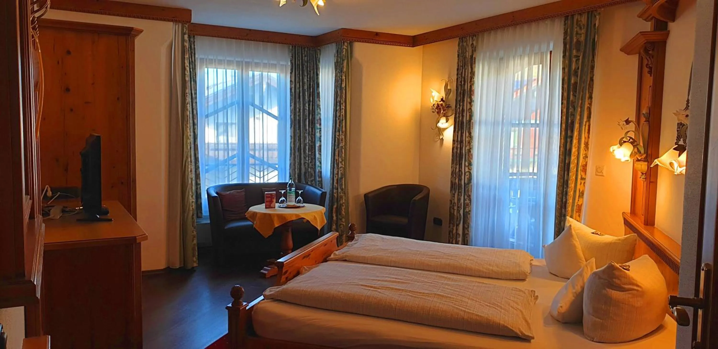 Bed in Alpenotel Rosenhof Ruhpolding, Wellness, Chiemgau Karte, Travelingo Bonus Programm