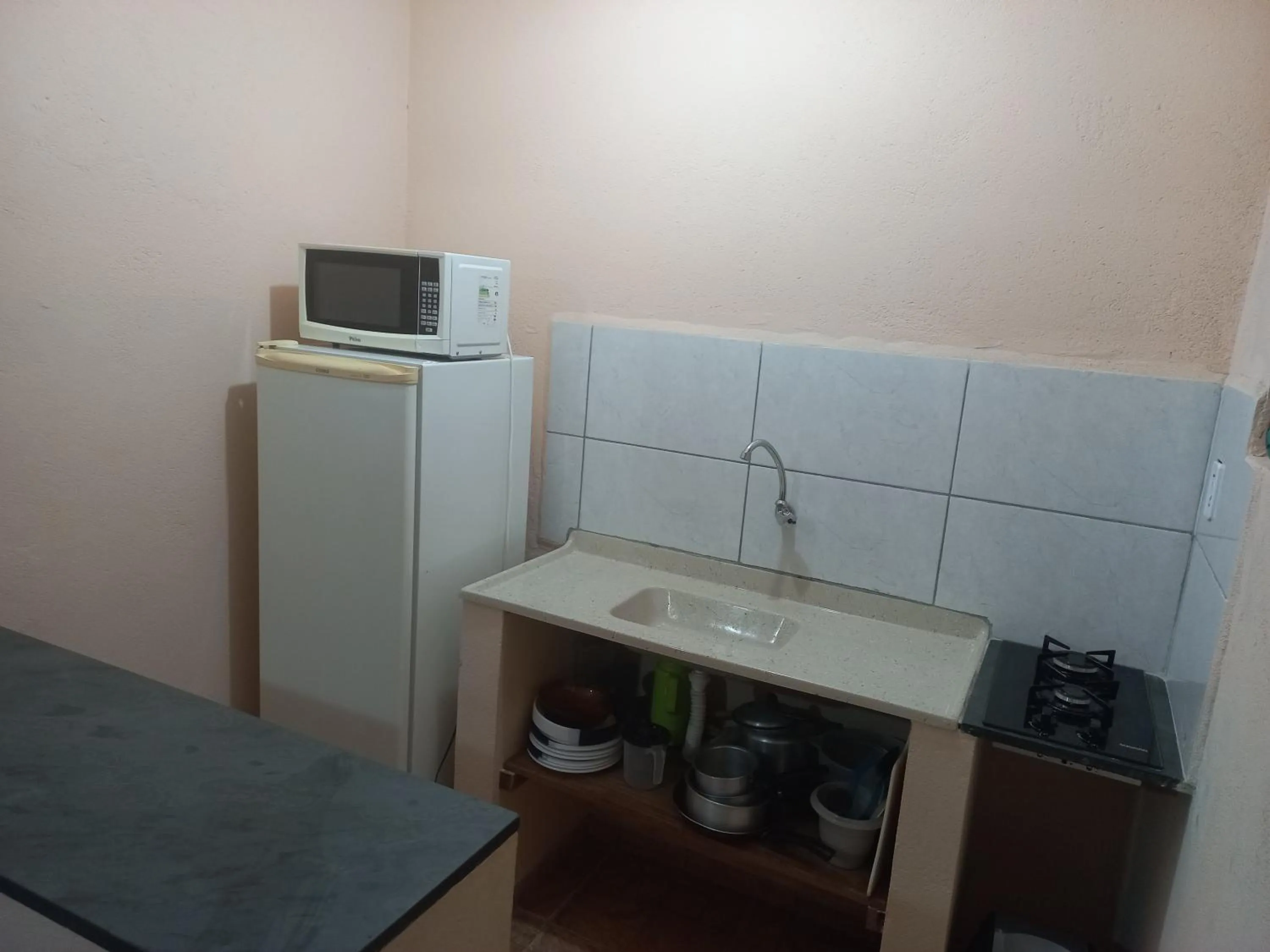 Kitchen or kitchenette in Locação p final de semana Mourada Térrea