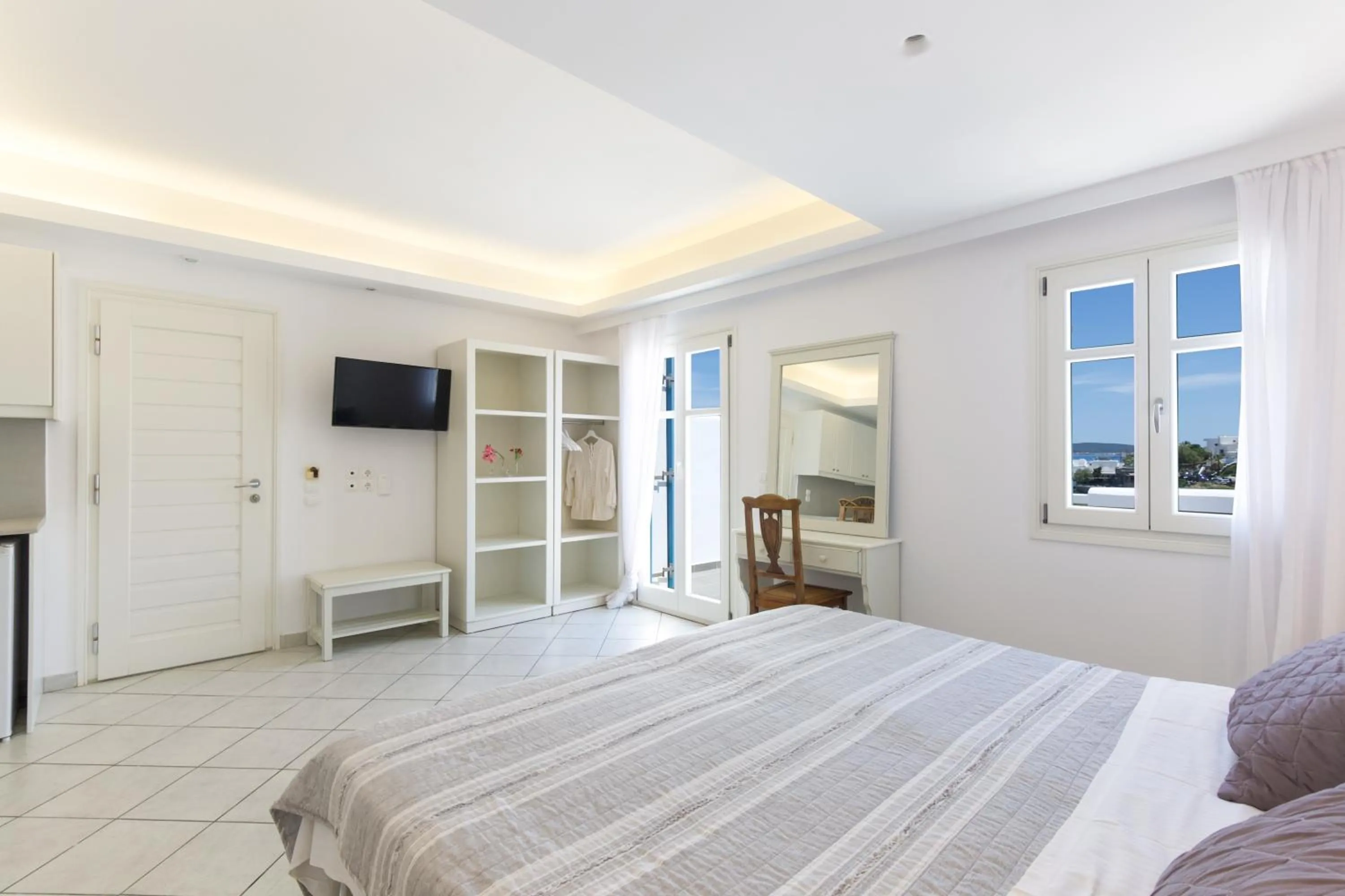 Bed in Alexandros Apartments