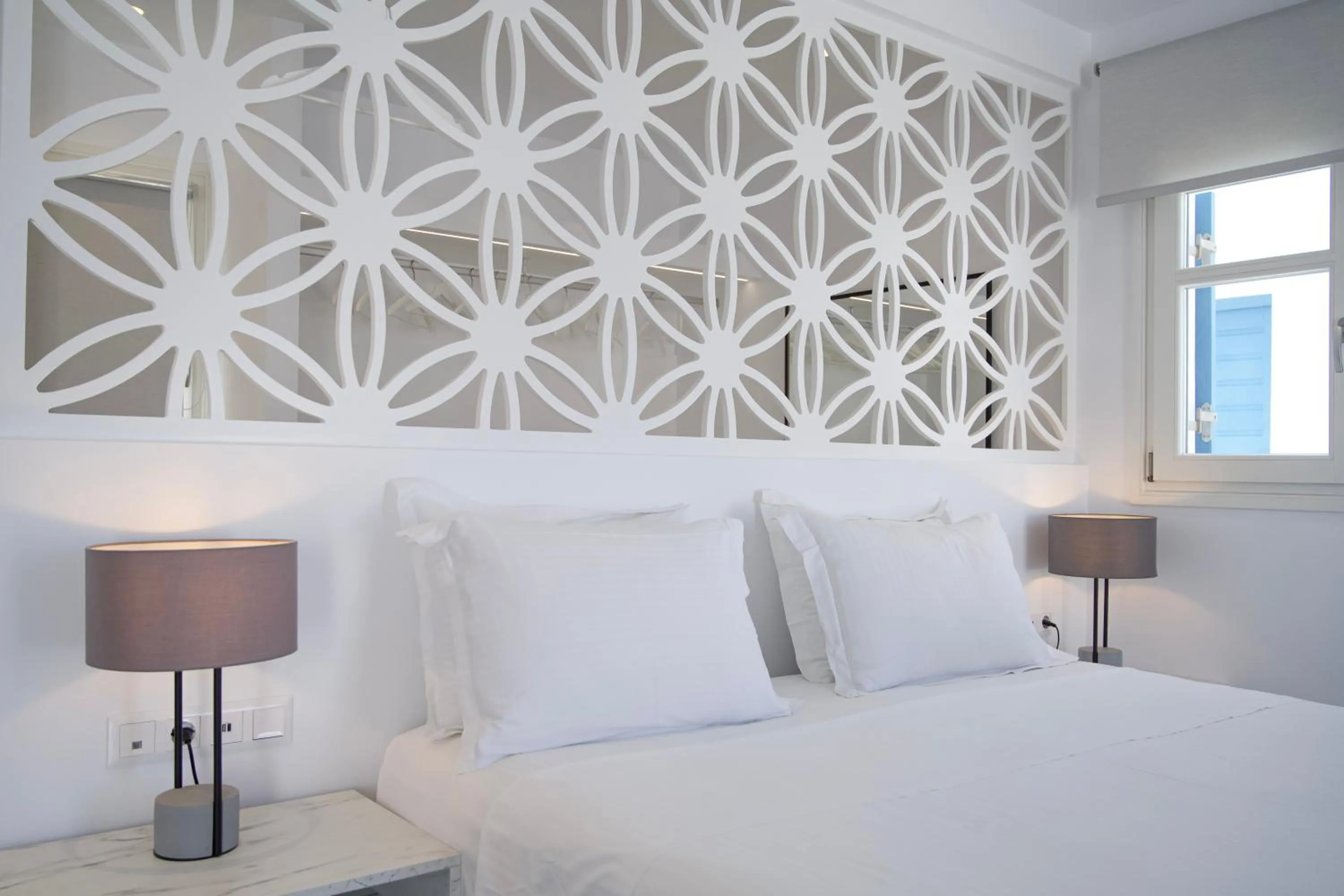 Bed in Alexandros Apartments