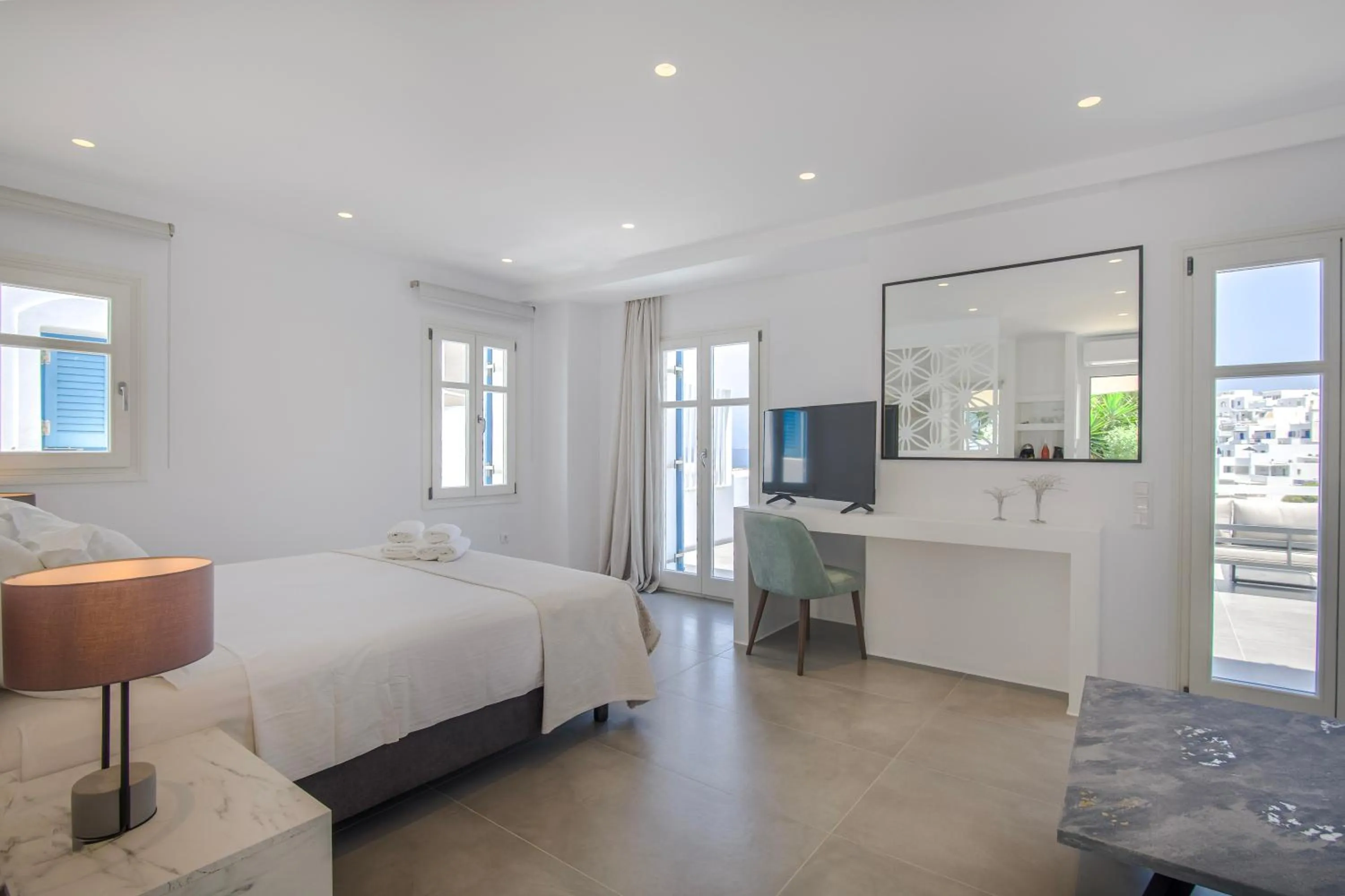 Bed in Alexandros Apartments