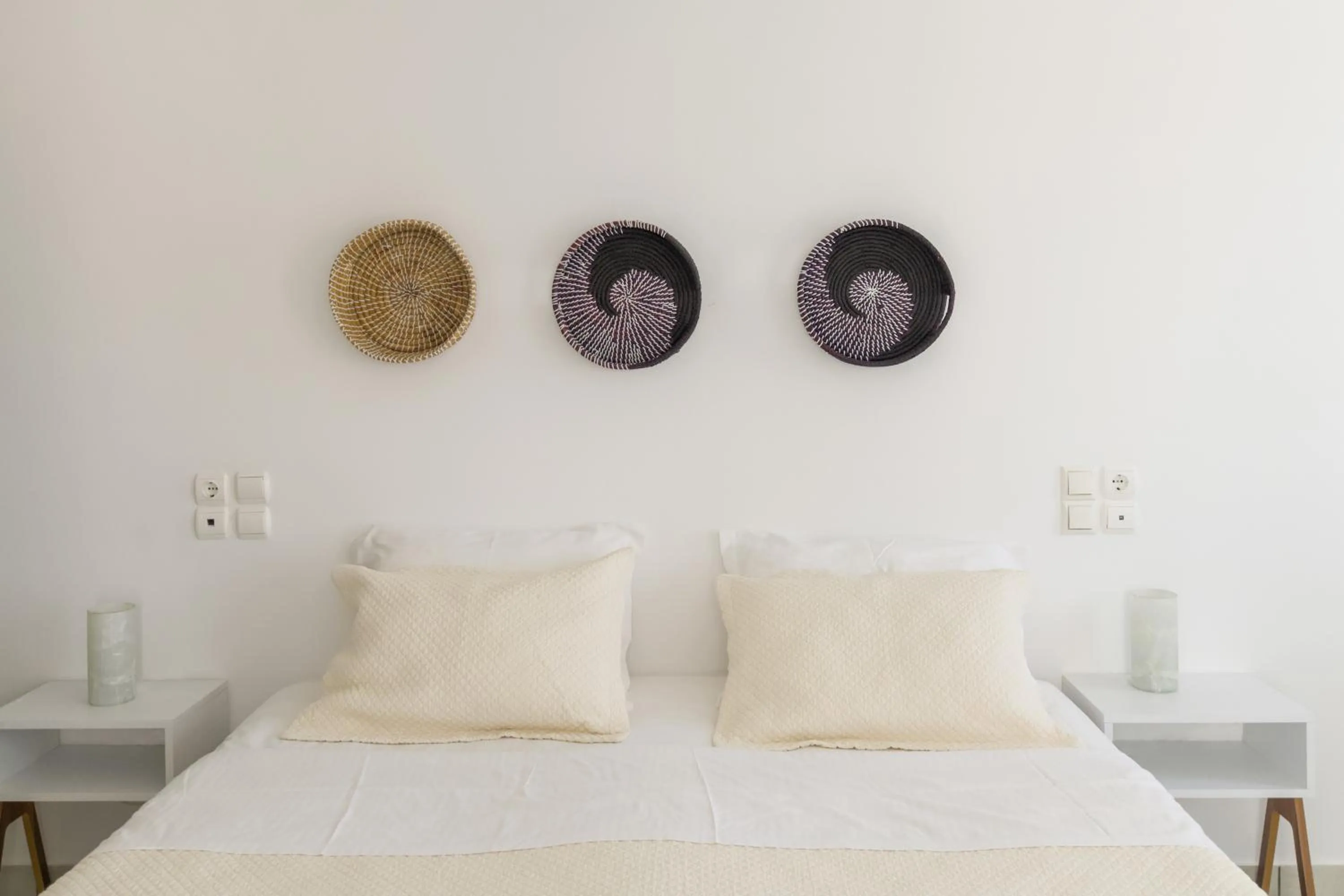 Bed in Alexandros Apartments