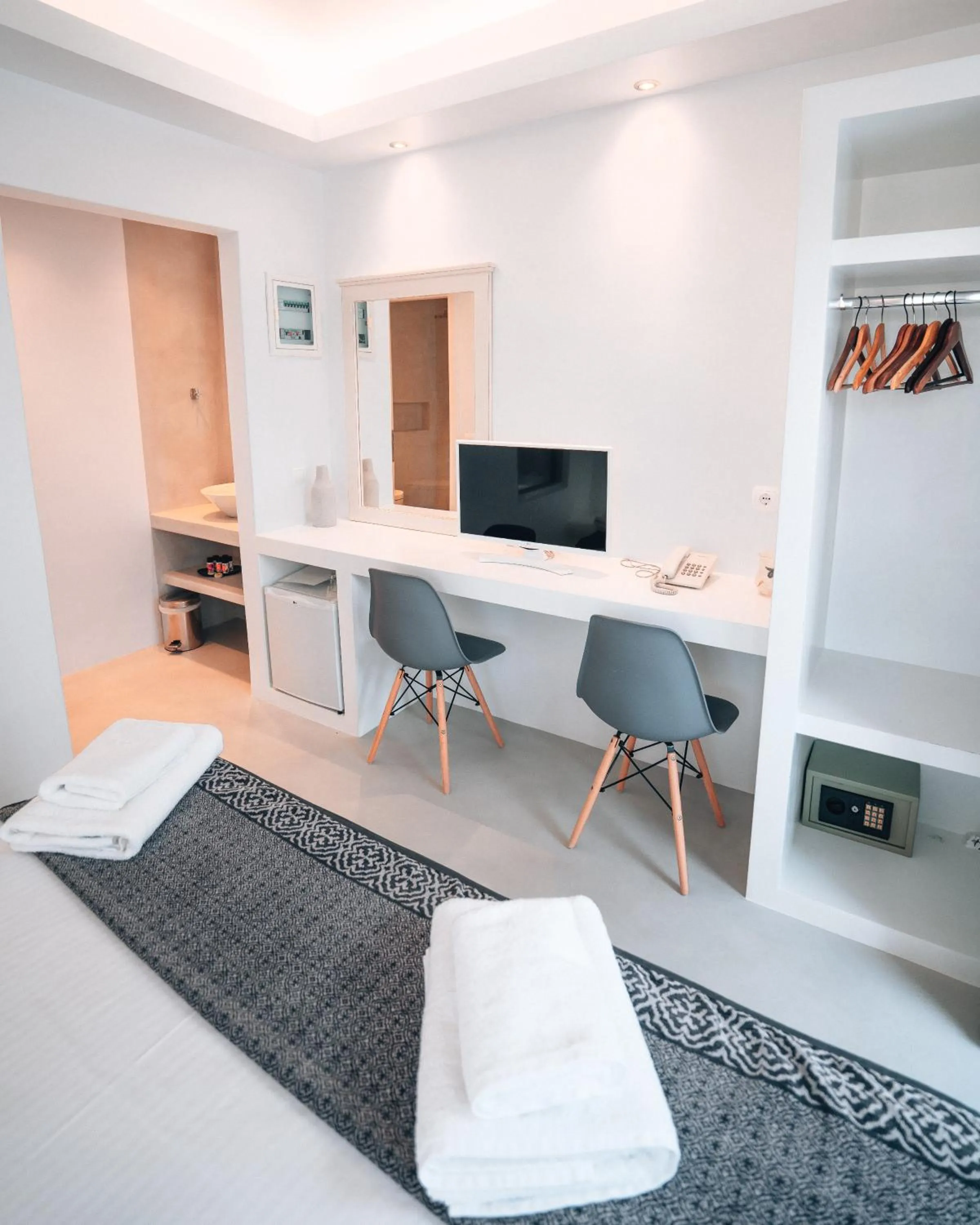 Bed in Alexandros Apartments