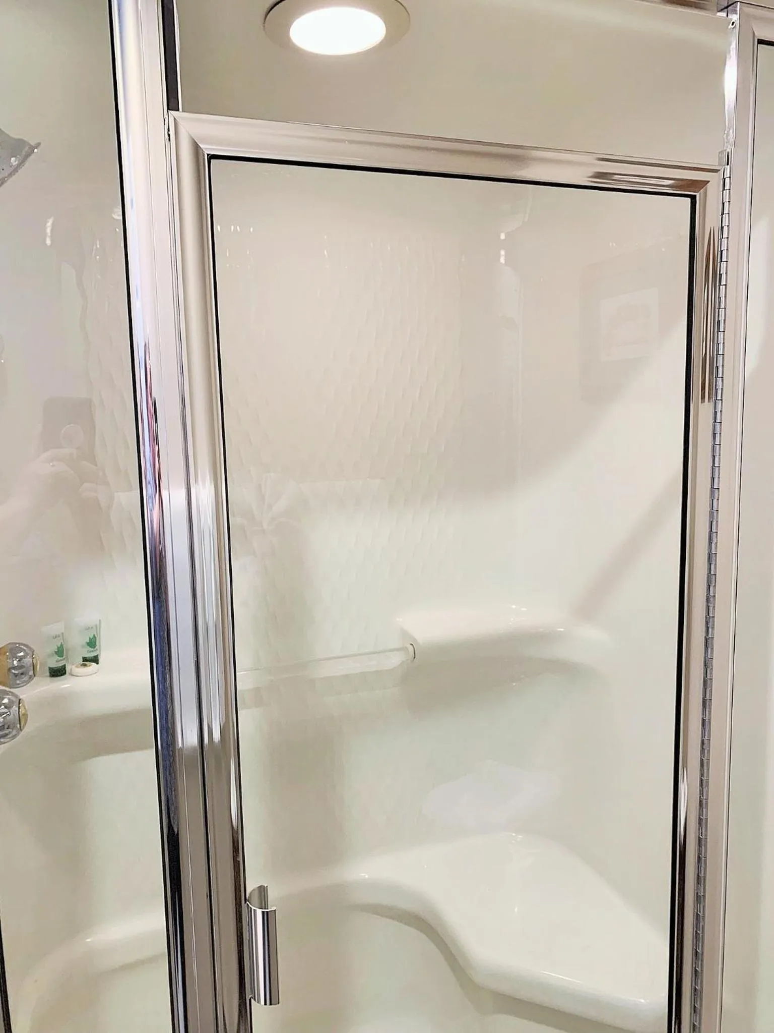 Shower in Breakers Boutique Inn