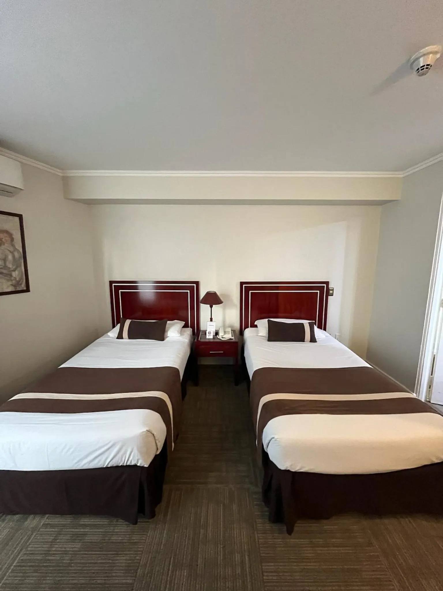 Bed in Hotel Leonardo da Vinci