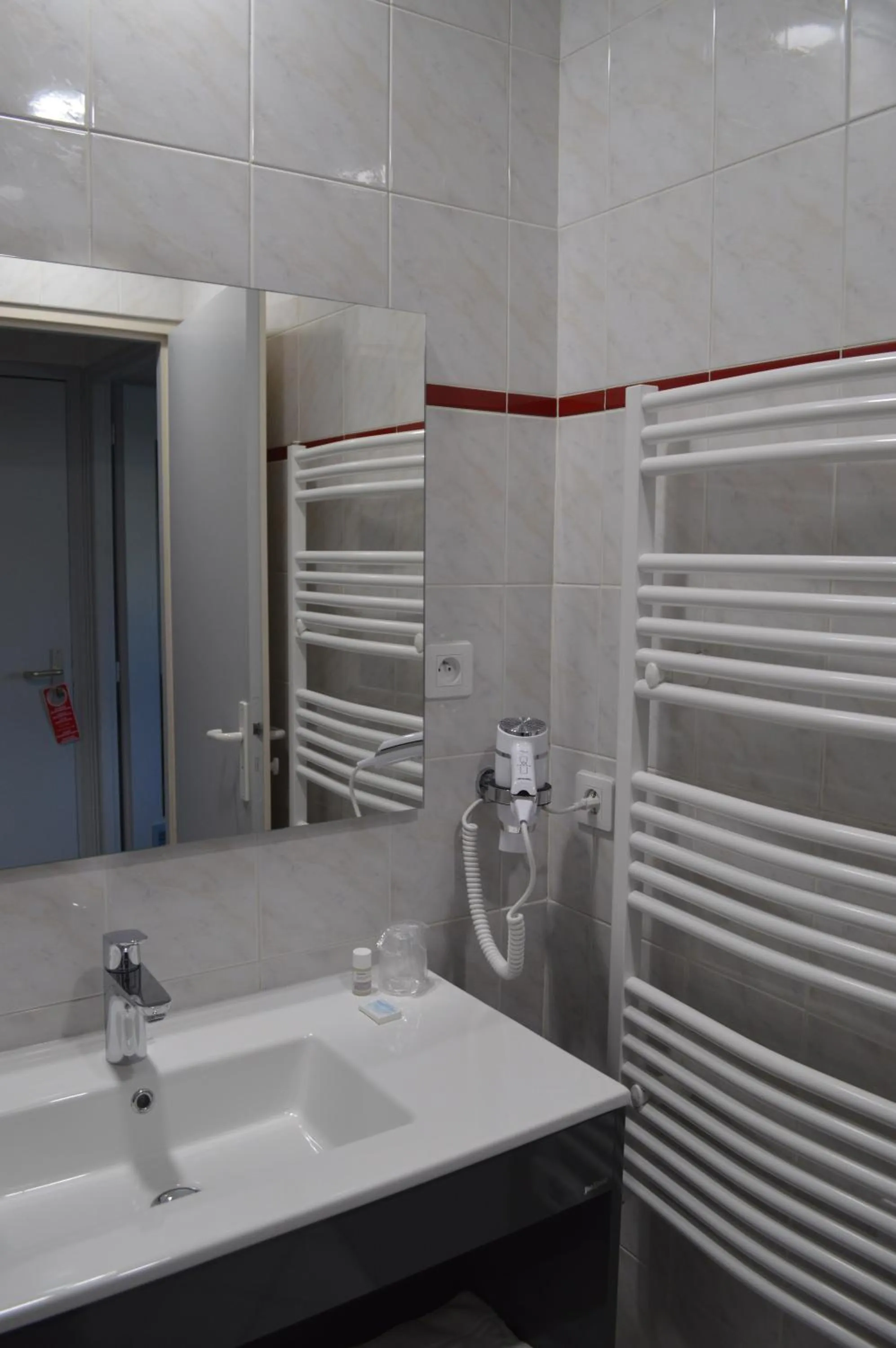 Property building in Logis Hotel du Parc-Restaurant - Le Rouget de Lisle