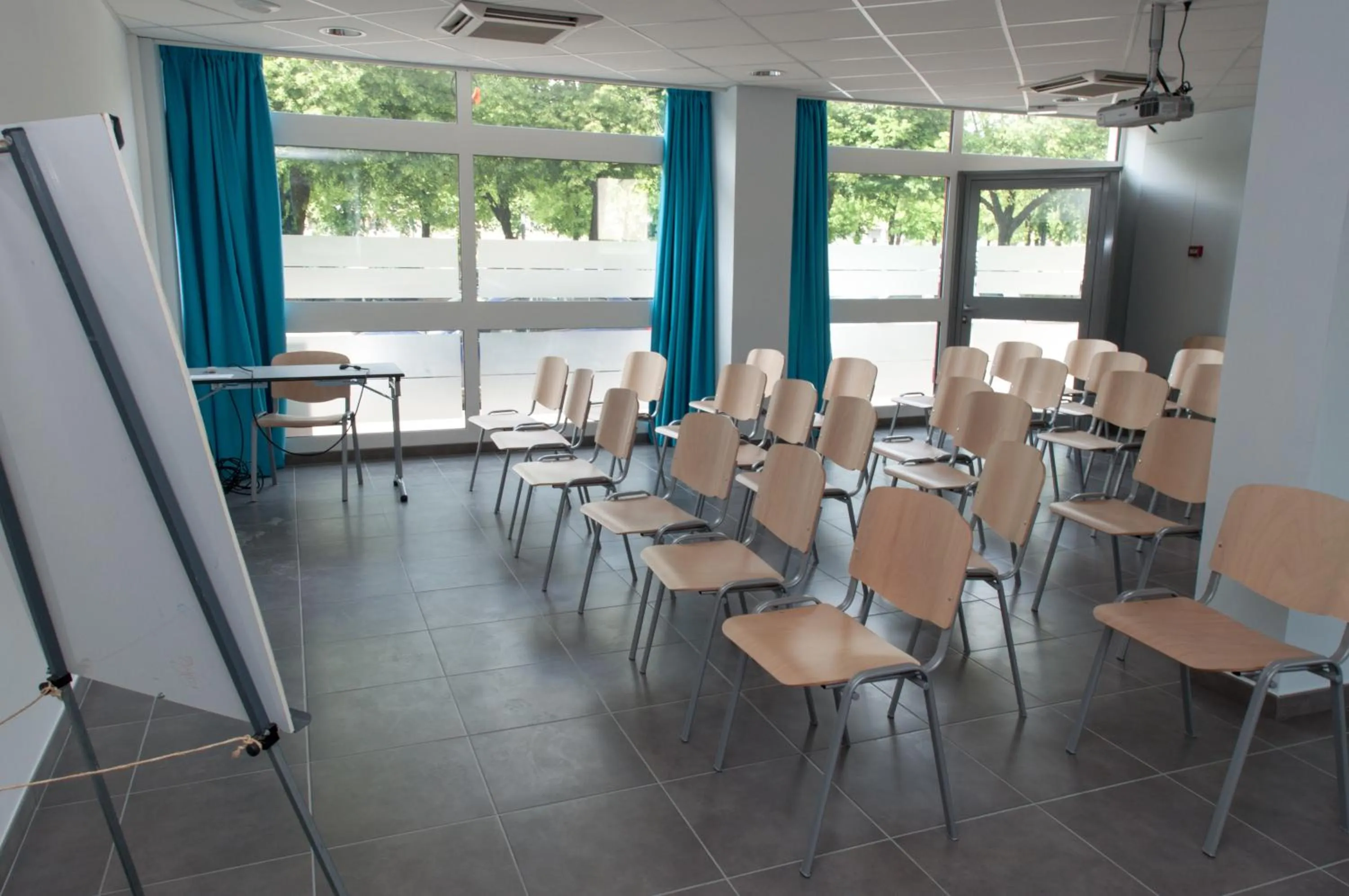 Property building in Logis Hotel du Parc-Restaurant - Le Rouget de Lisle