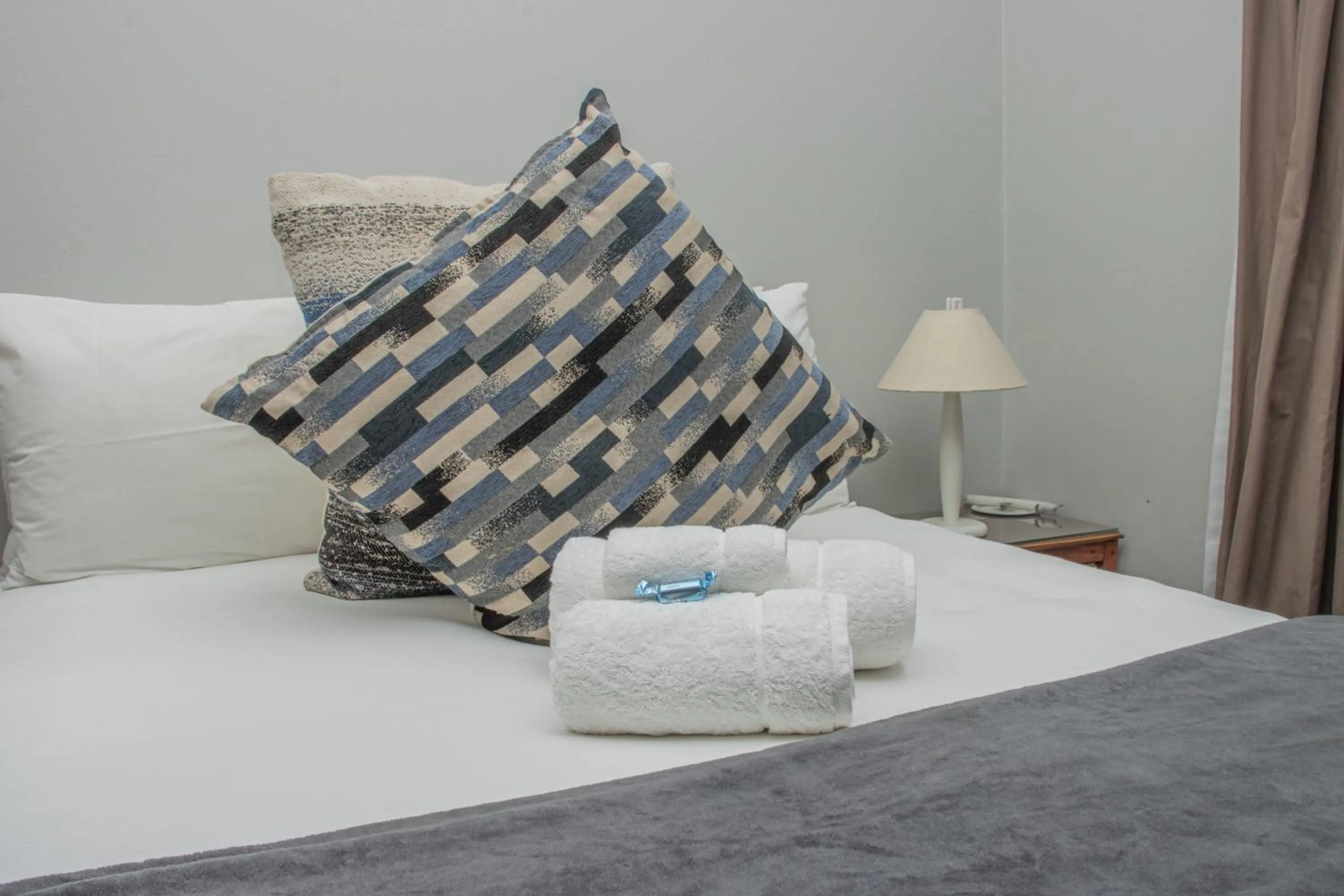 Bed in Woodpecker's Inn Guest House