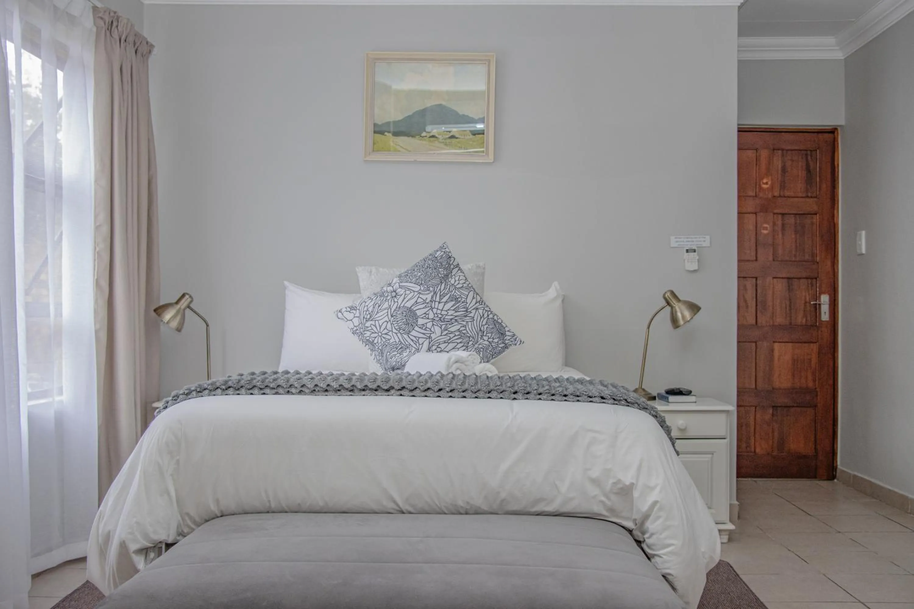 Bed in Woodpecker's Inn Guest House