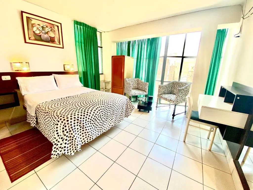 Bed in CasaHotel Jockey Plaza Mall