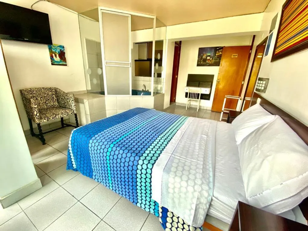 Bed in CasaHotel Jockey Plaza Mall