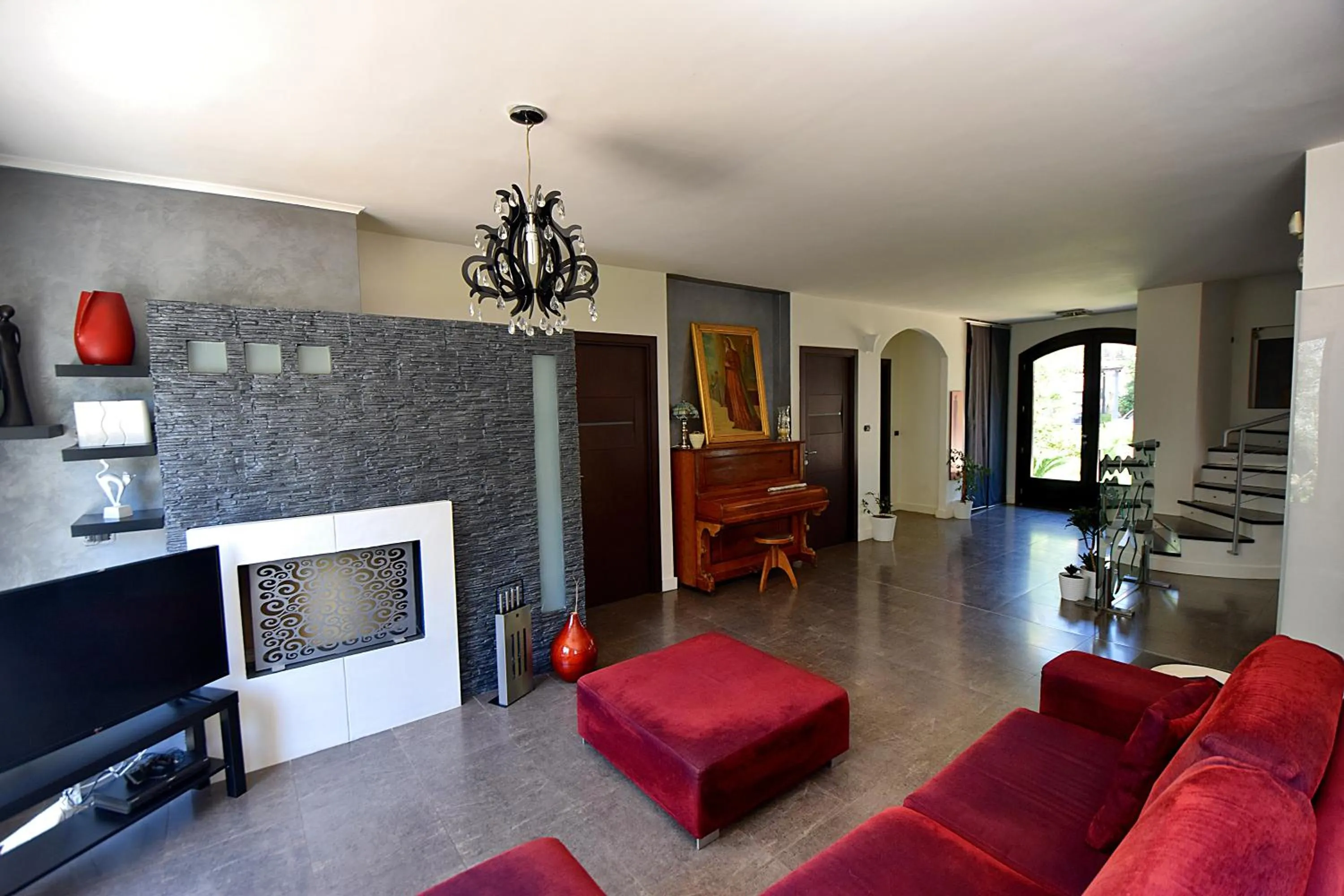 Communal lounge/ TV room in Villa La Mattina