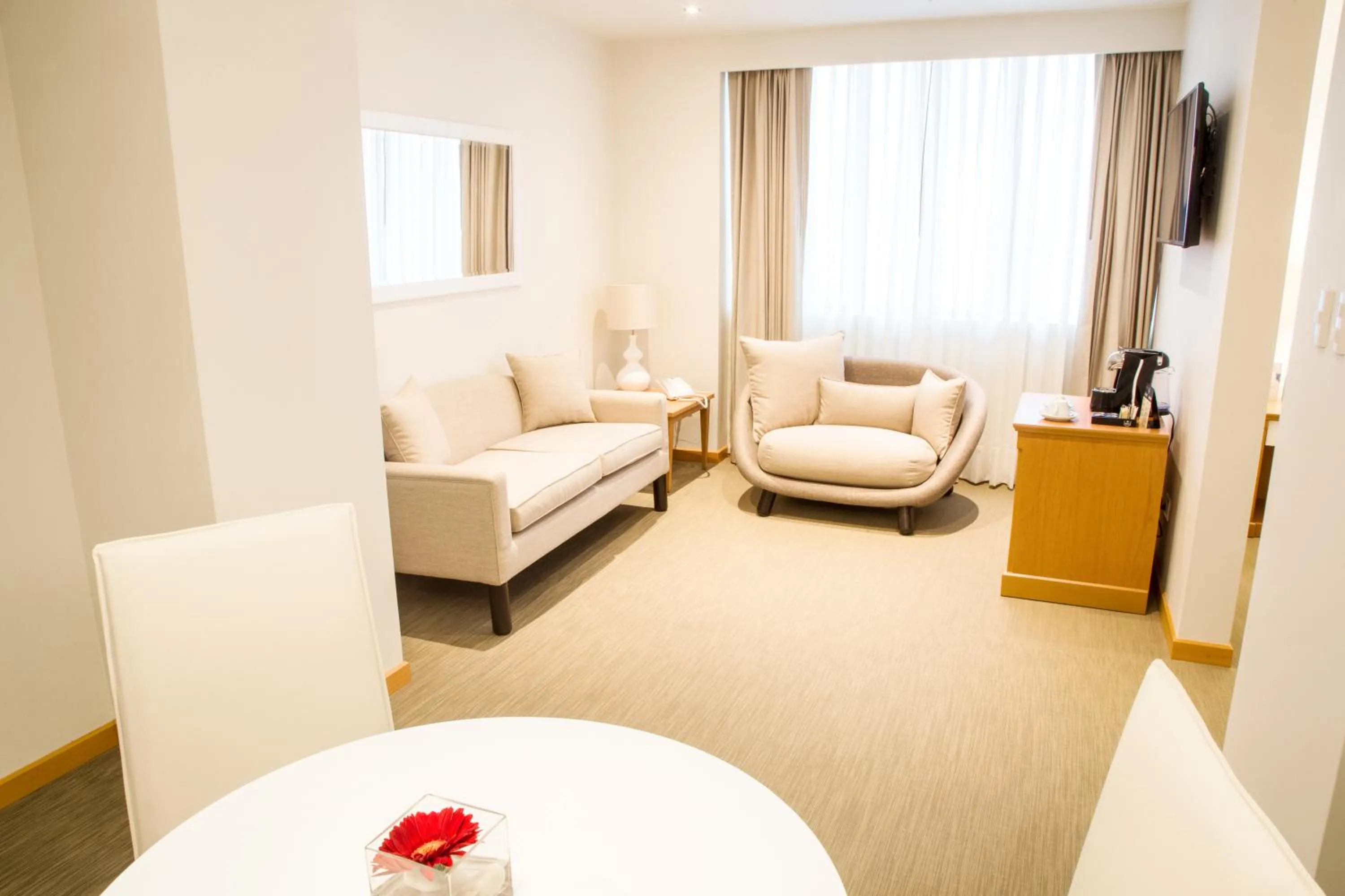 Living room, Bed in Hotel Melia Lima