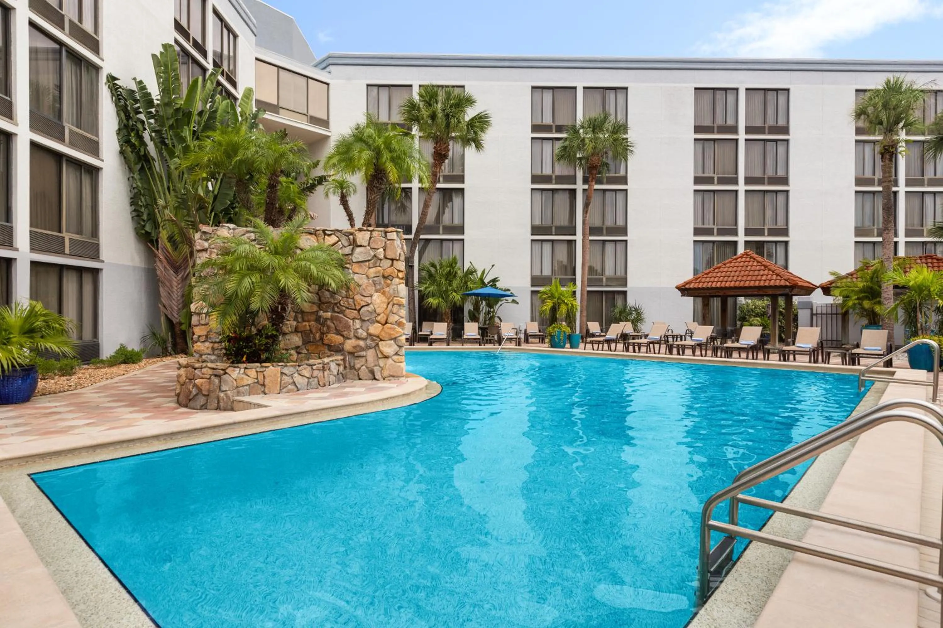 Swimming pool in Crowne Plaza Hotel Fort Myers at Bell Tower Shops, an IHG Hotel