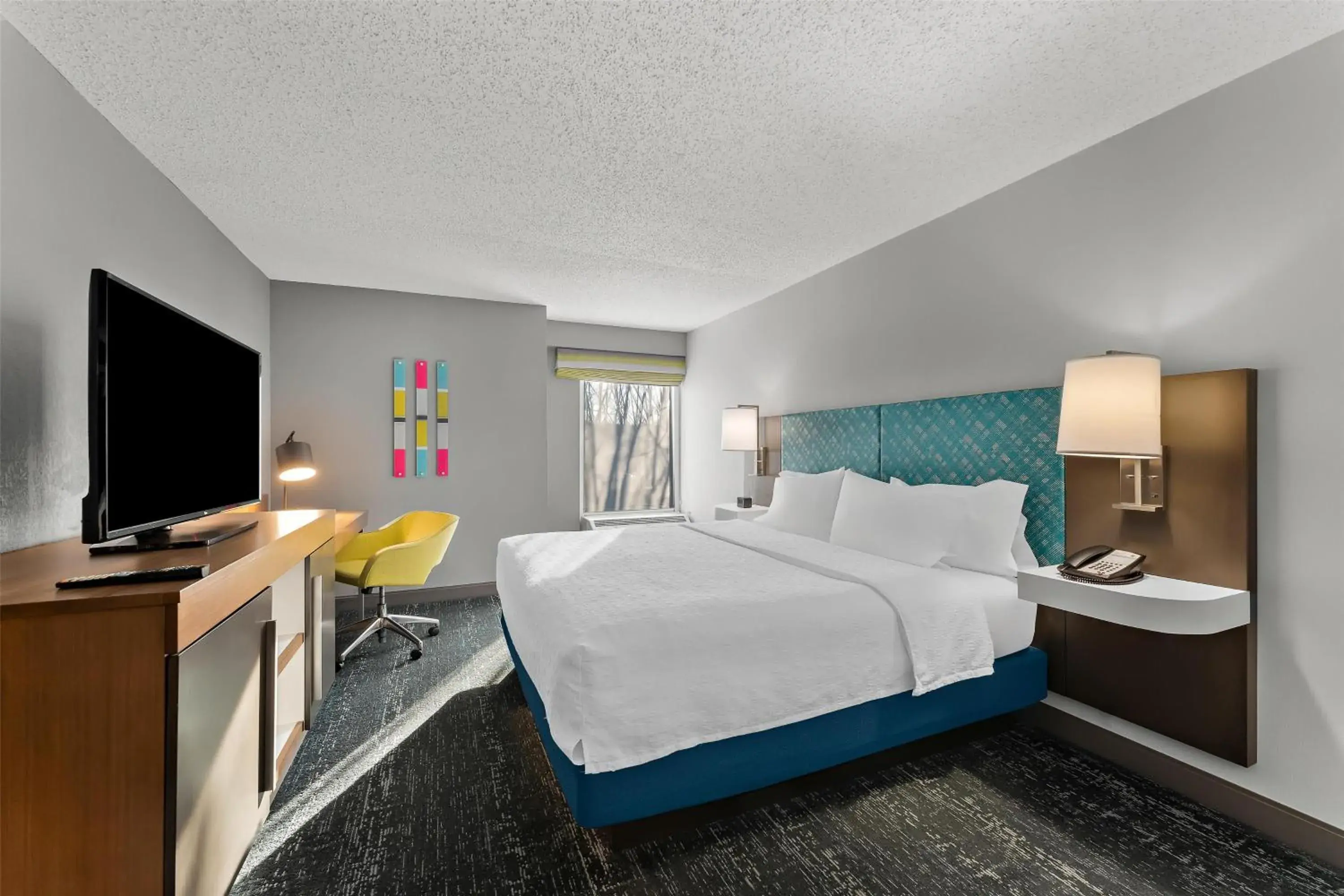 Bed in Hampton Inn & Suites Newtown Bed in Hampton Inn & Suites Newtown