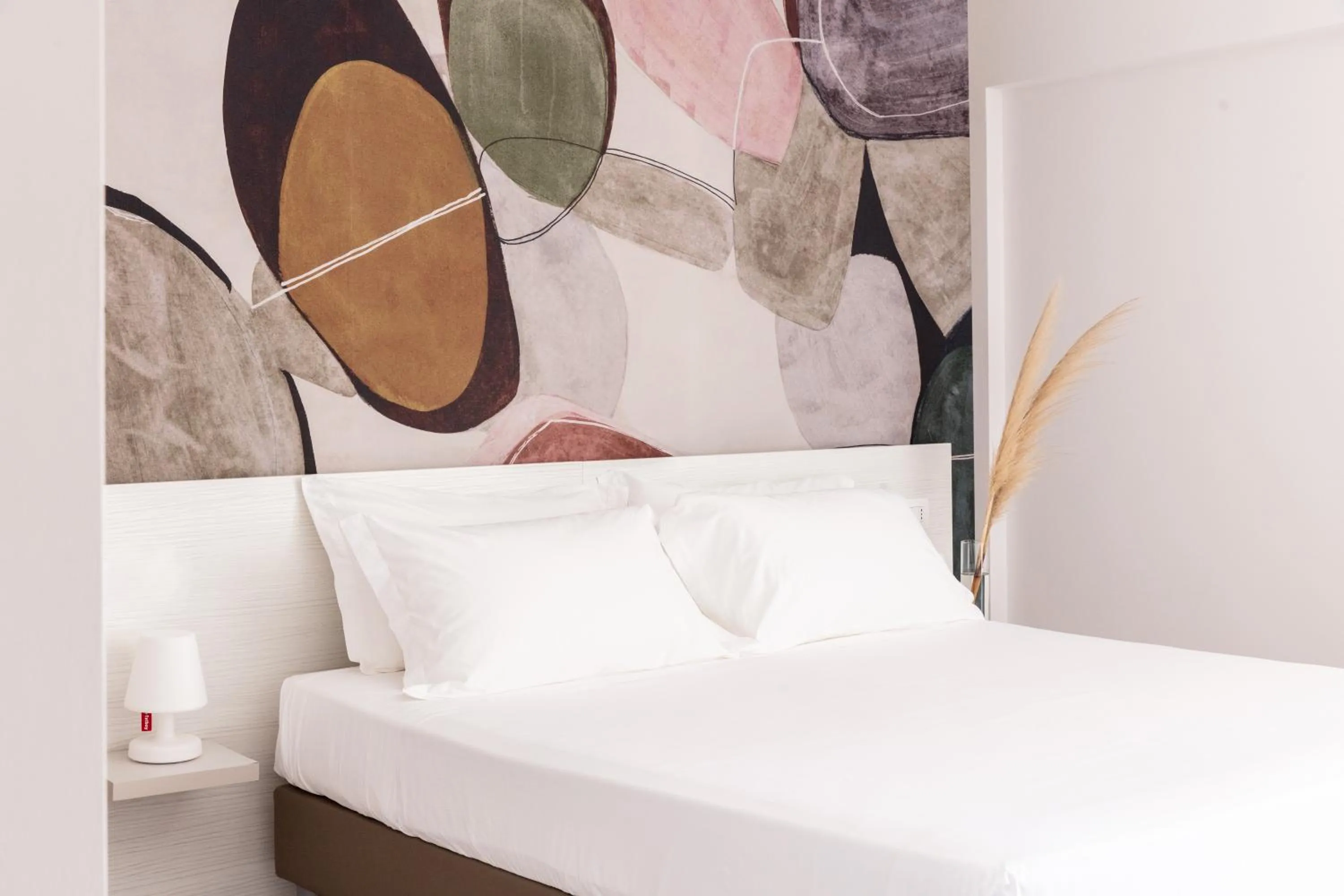 Bed in Luna Minoica Suites and Apartments