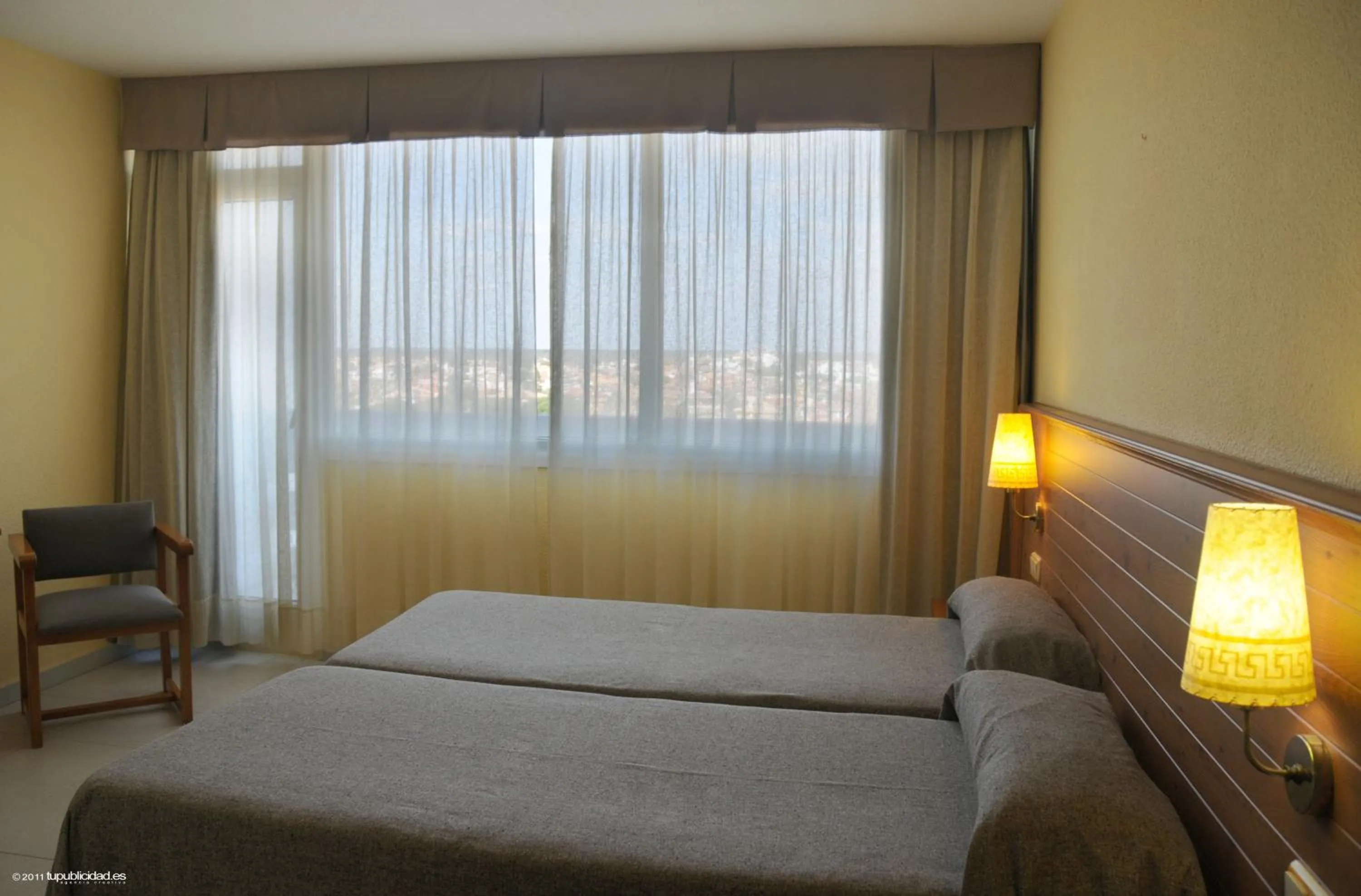 View (from property/room), Bed in Hotel Flamero