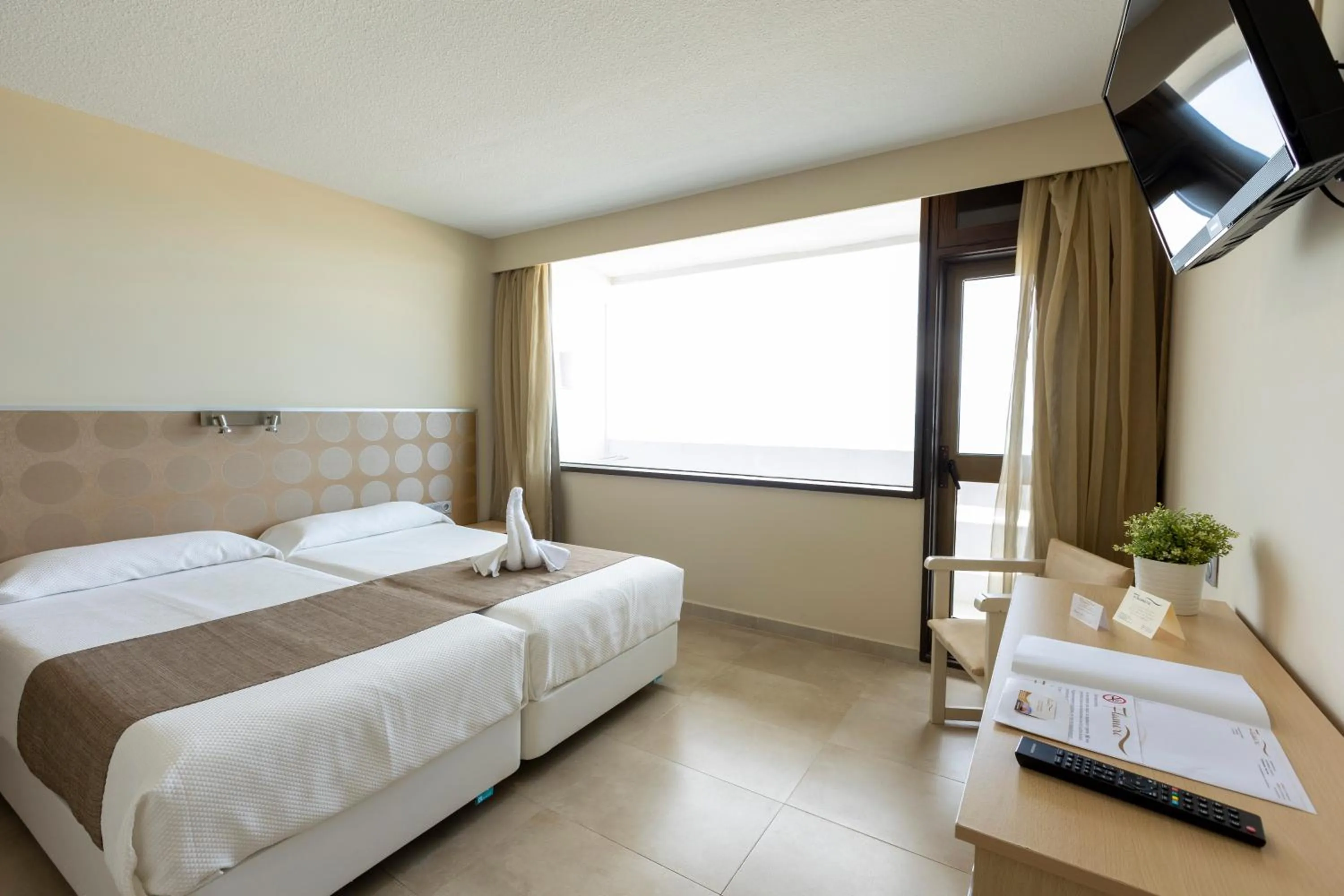 Bed in Hotel Flamero