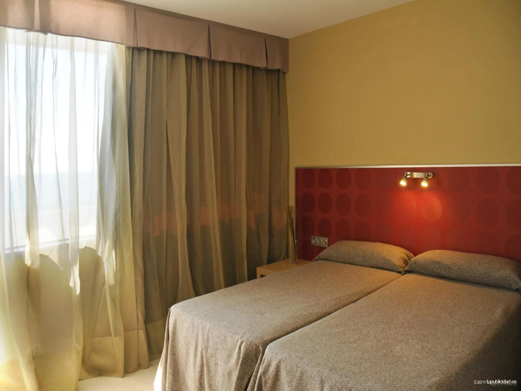 Bed in Hotel Flamero