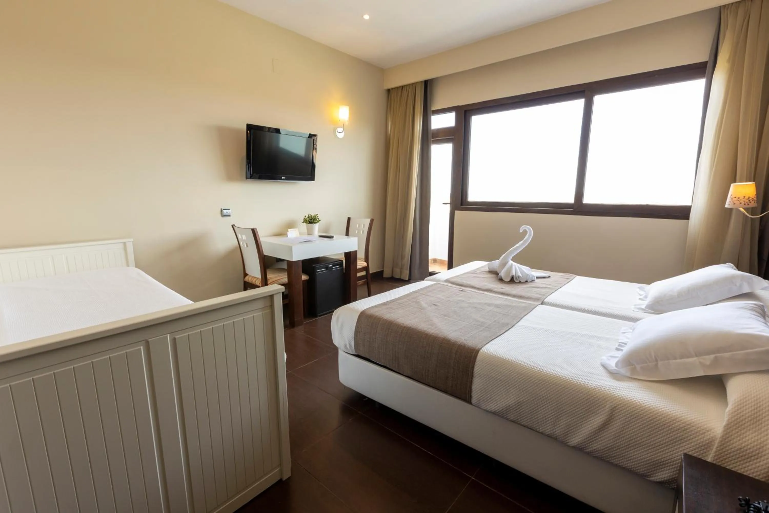 Bed in Hotel Flamero