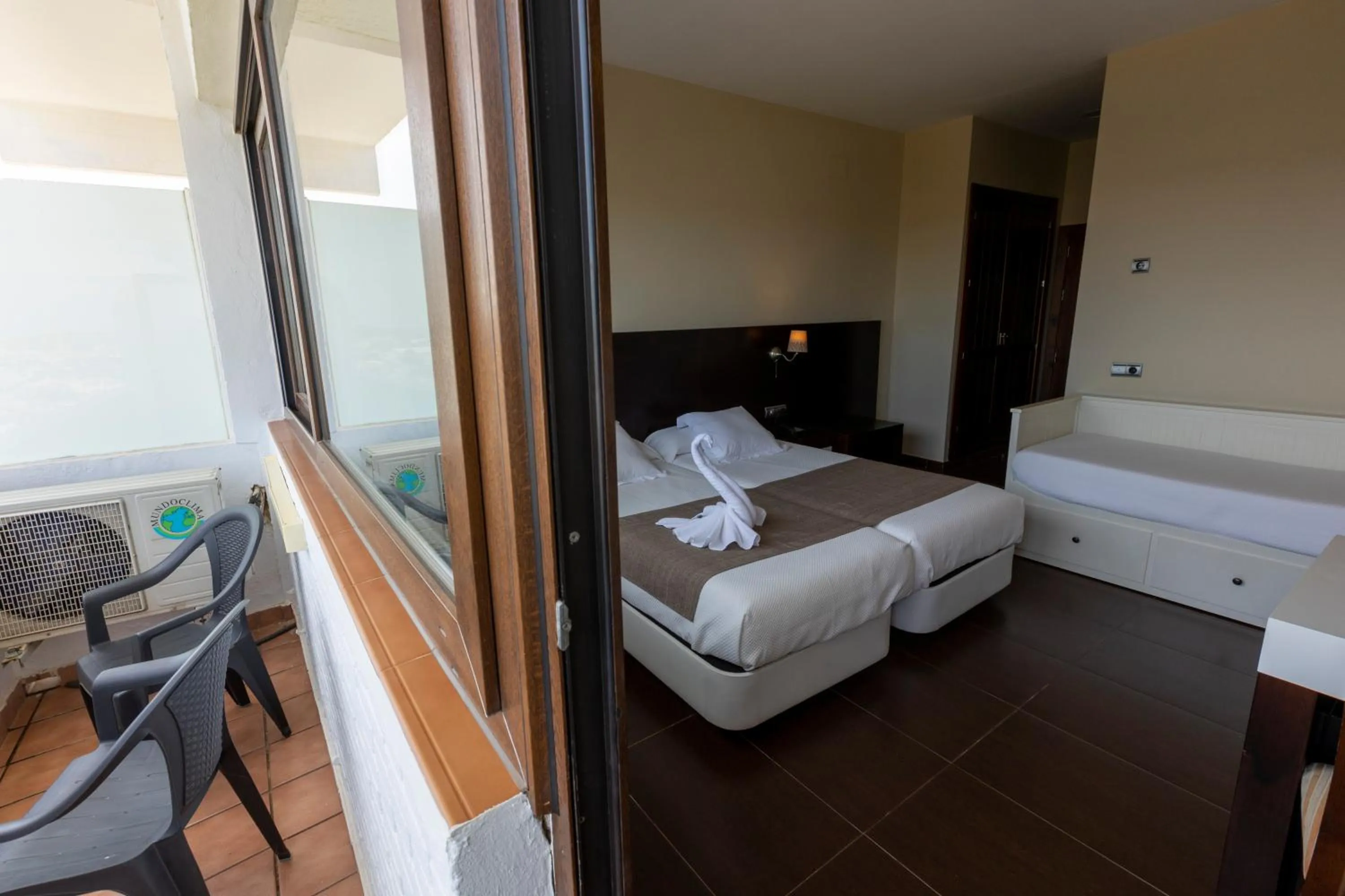 Bed in Hotel Flamero