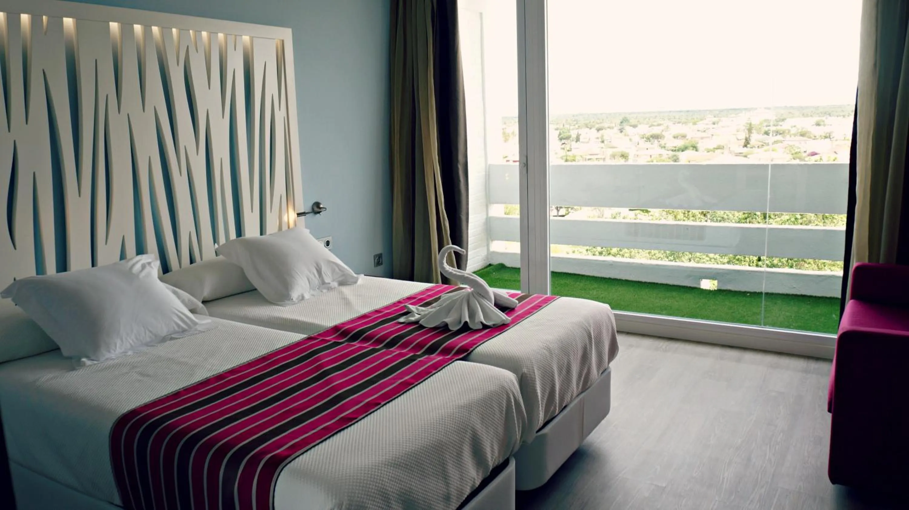 Bed in Hotel Flamero