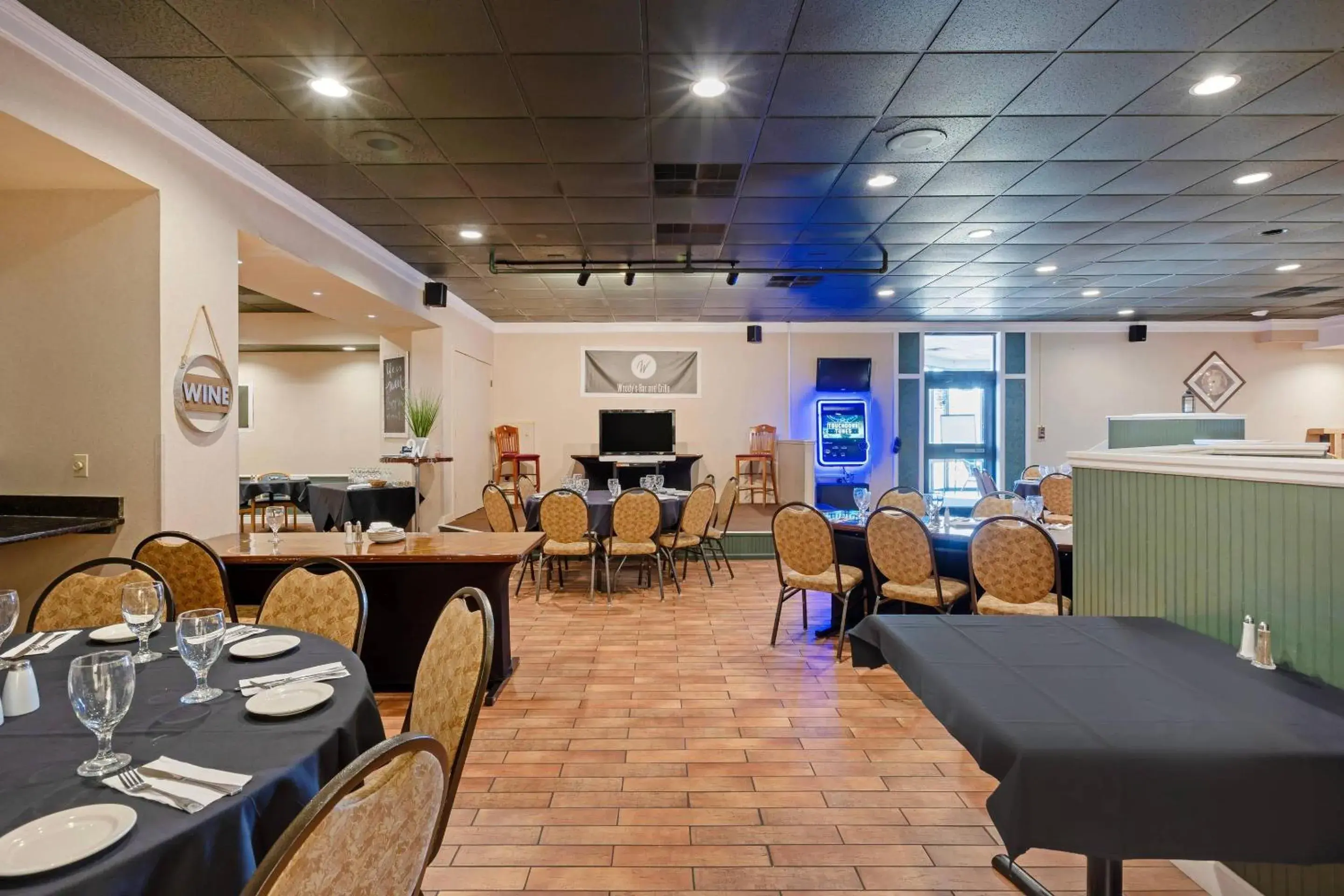 Lounge or bar in The Lux Hotel & Conference Center, an Ascend Collection Hotel Lounge or bar in The Lux Hotel & Conference Center, an Ascend Collection Hotel