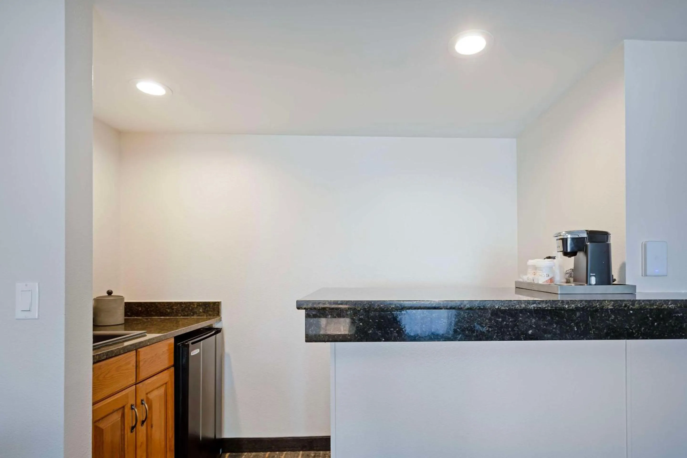 Bedroom in The Lux Hotel & Conference Center, Ascend Hotel Collection