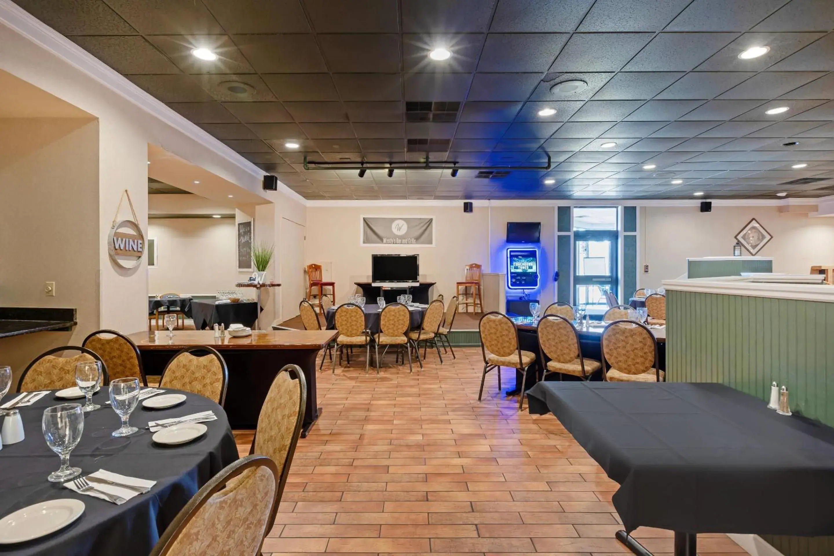 Lounge or bar in The Lux Hotel & Conference Center, an Ascend Collection Hotel Lounge or bar in The Lux Hotel & Conference Center, an Ascend Collection Hotel