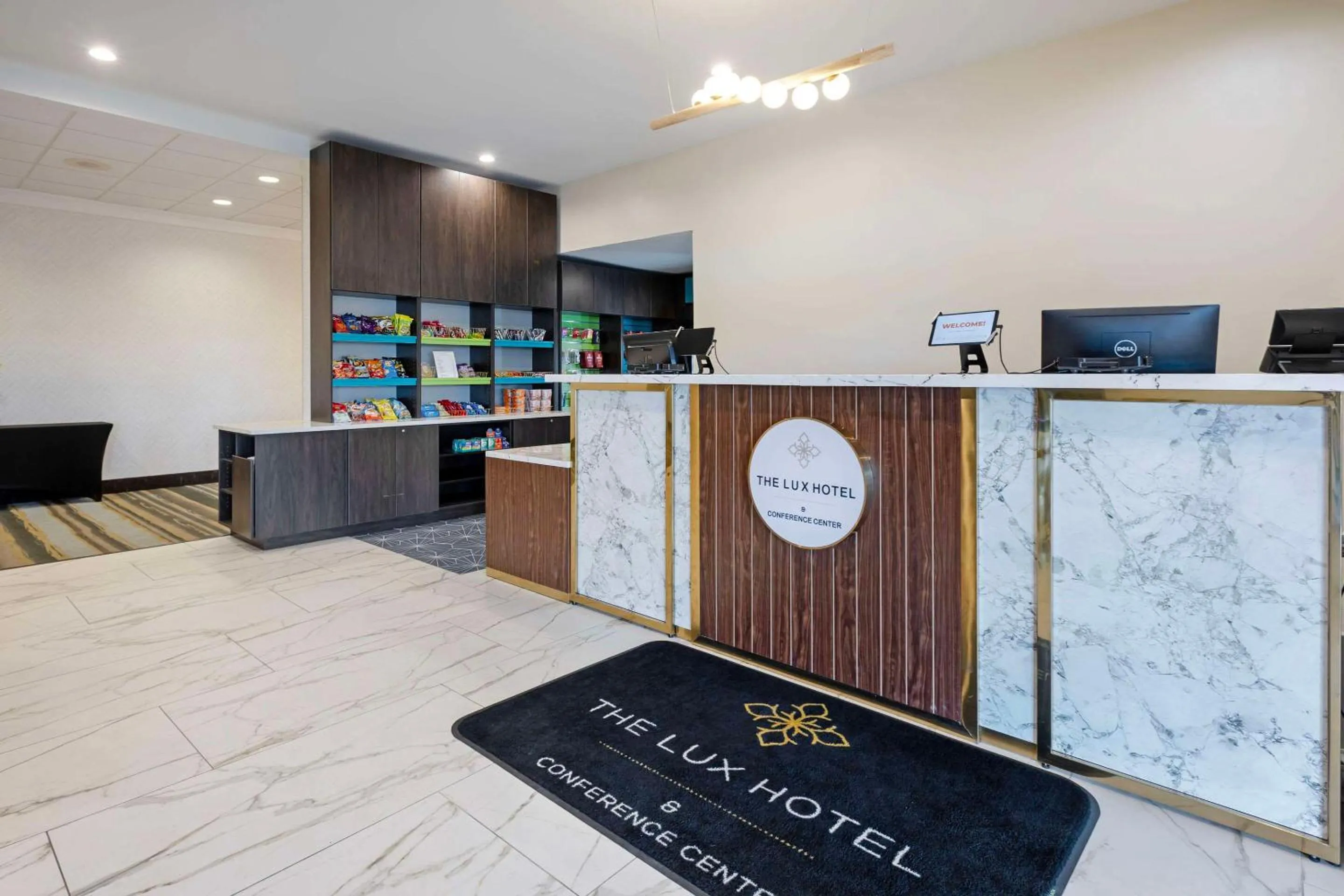 Lobby or reception in The Lux Hotel & Conference Center, Ascend Hotel Collection